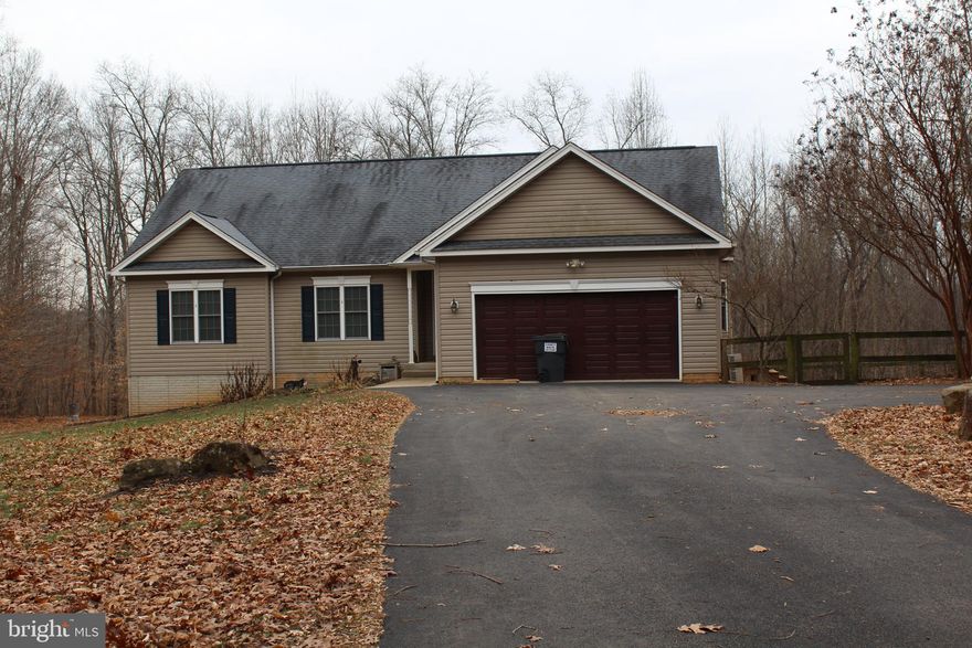 LOVELY ONE LEVEL LIVING WITH PARTIALLY FINISHED BASEMENT, 2 CAR GARAGE ON A VERY PRIVATE 6.2 ACRES LOT.   MAIN FLOOR LIVING AREA BOASTS HARDWOOD FLOORS, BEDROOMS HAVE NEW CARPETING. LARE KITCHEN WITH WALL OVEN AND COOKTOP.  THIS HOME IS LOCATED IN THE BRANDY STATION AREA AND OFFERS EASY ACCESS TO RT 29 FOR NORTH AND SOUTH TRAVEL. ENJOY THE PEACE AND QUIET FROM THE SCREENED PORCH AND BACK DECK.  A SMALL AREA OF SIDE YARD IS FENCED FOR PETS (PETS ARE CONSIDERED CASE BY CASE).  PAVED DRIVEWAY.