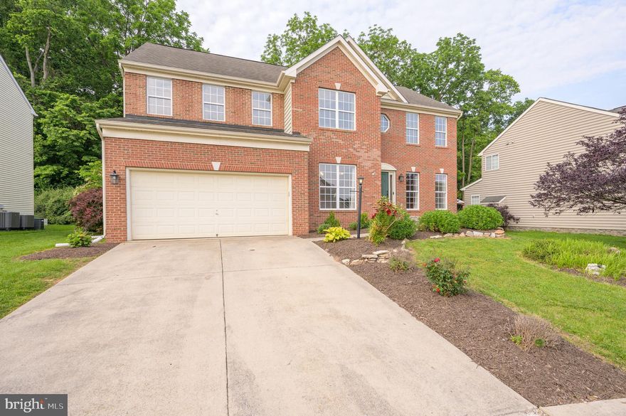 Welcome home to this beautiful colonial in the desirable neighborhood of The Gallery. Located just minutes from everything in Martinsburg and all major routes connecting Maryland, Virginia and Charles Town this well maintained home is ready for its next owner. Inside you will find a remodeled kitchen with fresh white cabinets and quartz countertops, a two story living room with gas burning fireplace and lots of space to spread out. The first floor features a large galley style kitchen with island, a formal sitting room, formal dining room, office and living room areas. The second floor features a large expansive master bedroom with huge walk in closet and bathroom with a new double sink vanity, soaker tub and walk in shower. The second floor also features three other bedrooms with 2 more walk in closets, a guest bathroom and laundry room. The basement has been fully finished and features walk out stairs, a wet bar, full bathroom, spare room (non legal 5th bedroom), utility room and large common area great for a theatre or gaming setup. Outside the large decks overlook the backyard and waterfall that can be turned on and off with the flip of a switch. The sellers are also including a one year home warranty with this sale so come see this one today it may be the oasis you've been waiting for!