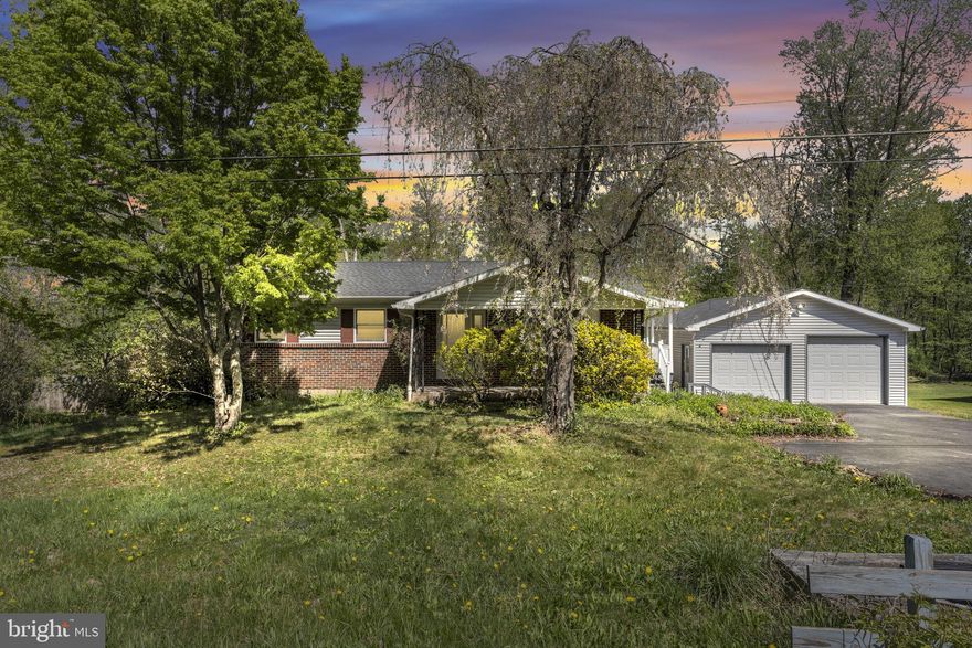 Enjoy the peace, quiet, and scenic countryside from this charming ranch home, perfectly situated on just over a half-acre of level, usable land. Offering over 1,400 square feet of finished living space, this property combines comfort, functionality, and incredible potential.
A standout feature is the massive detached 2-car garage—ideal for hobbyists, car enthusiasts, or anyone in need of extra storage or workspace. With both a 7-foot and 6-foot garage door, it offers flexibility for a variety of uses.
Inside, the main level features a spacious family room, a generously sized eat-in kitchen, two well-proportioned bedrooms, and a full bath. The home has already seen key updates, including a newer roof and furnace, giving you a solid foundation to build upon.
The walk-out lower level adds valuable living space with a bright, finished area perfect for a rec room, along with a potential third bedroom. There is also rough-in plumbing in place, making it easy to add a second full bathroom. Additional storage space is abundant throughout.
This home is a fantastic opportunity for buyers looking to build equity and add their personal touch. With great bones, major updates already completed, and a desirable setting, the possibilities here are endless.
Schedule your private showing today to explore all this property has to offer!--
