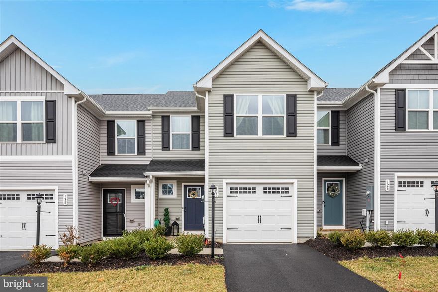 Built in 2023 and located in the desirable Cardinal Pointe community, 130 Calais Place offers a polished and inviting townhome lifestyle with thoughtful spaces designed for both comfort and function.
The main level welcomes you with LVP flooring in the foyer and kitchen, stainless steel appliances, recessed lighting, and an open layout that easily accommodates a generously sized dining table. The spacious adjoining family room creates an effortless flow for gathering, relaxing, or entertaining.
Upstairs, the bedrooms are well-proportioned and offer ample space to comfortably accommodate full bedroom furnishings. The home presents beautifully and has been meticulously maintained, delivering a truly turnkey, move-in-ready experience.
Step outside to a spacious backyard with a private patio — ideal for outdoor dining, morning coffee, or unwinding in the evening. A one-car garage combined with an extended driveway comfortably accommodates three vehicles, adding everyday convenience and flexibility.
The home is topped with architectural shingles, offering both durability and visual appeal. Conveniently located near Route 9 and I-81, with shopping, dining, and commuter routes nearby, 130 Calais Place blends space, functionality, and ease in a setting you’ll love coming home to.