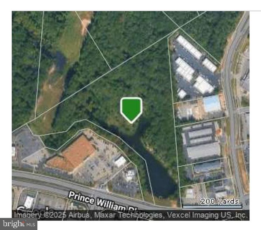 Large Parcel of wooded land located directly on Prince William County Pkwy, blocks from Potomac Mills Mall and accessible to multiple commuter routes, shops, restaurants, surrounding businesses.   18.112 acres of vacant land encumbered by steeply sloping topography, a stormwater management facility of approximately 5.9 acre and 12.9 acres identified as RPA.   Wooded lot with storm water retention pond and storm water drain system.   Water pond is not usable for recreation.  This parcel is the remaining segment of a larger piece of land previously sold off; this is the last parcel remaining from the original piece of land.  The property is located on WB Prince William Parkway (Route 294) between Worth Avenue and Telegraph Road. It is surrounded by mixed uses including industrial, office, and commercial.  Buyers and developers are advised to contact the Zoning Office for Prince William County regarding any usage or development options.  Information provided with the listing is to the best of knowledge of the property owners and/or the listing agent at this time.   DO NOT walk on property without prior consent of  listing agent.  Contact listing agent directly with any other questions or to request a showing.