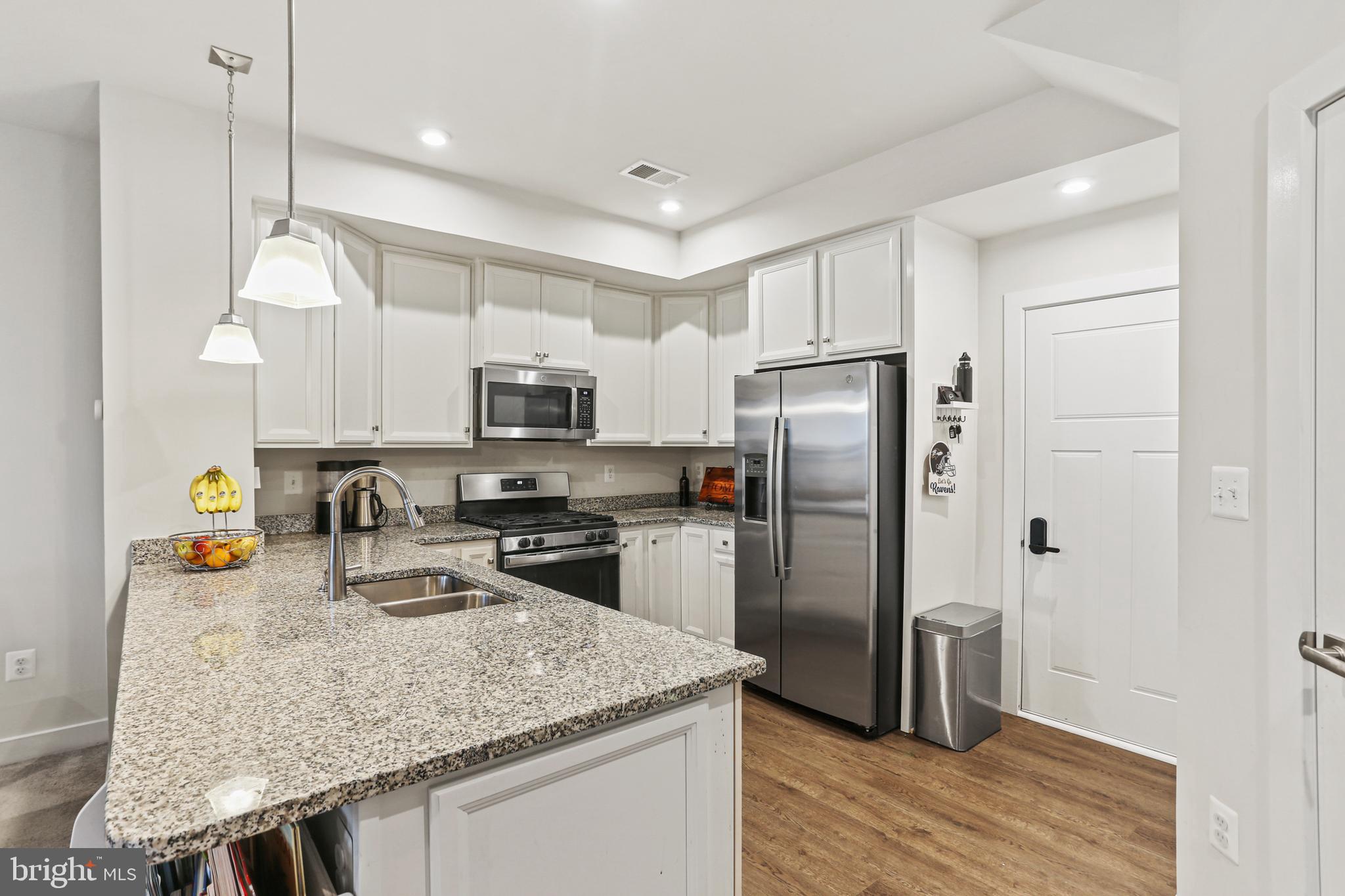 Stunning 3-year-old townhouse w/ 1 car attached garage. Elegant and spacious, the open floor plan is perfect for entertaining. Home boasts 9-foot ceilings, recessed and pendant lighting, stylish luxury vinyl plank flooring, neutral decor, a balcony, powder room and more... The gourmet kitchen features 42-inch white cabinets, granite countertops, a breakfast bar, gas cooking, and stainless appliances. Only one level of stairs to climb. 2nd floor has three bedrooms, each with generous closet space, and a bedroom-level laundry room. 
The primary owner's suite has TWO large walk-in closets, an adjoining luxury bathroom w/ double vanity,  large 2-person shower w/ seating, and dual shower heads. This is a townhouse-style condo so that means there is no grass to mow or bushes to trim as the condo assoc handles all the exterior yardwork. Just a lovely, low-maintenance place to live. Paddock Pointe in Howard County offers luxury living with a great school district and the low-maintenance lifestyle you crave. 

A commuter's dream location, with easy access to Rt. 1, I 95, 295, 216, Rt. 32 -minutes to the B/W Pkwy and walking distance to the Laurel Marc Train! Everything you need is at your fingertips. Community amenities include a dog park, community garden, and trails to enjoy. Conveniently located near shops, entertainment, Laurel Town Centre, Fort Meade Army Base, & NSA. Avail Jan 1st. Sooner dates are negotiable. 

Owners are moving out this weekend. Come to open house Wed evening 5:30-6:30pm