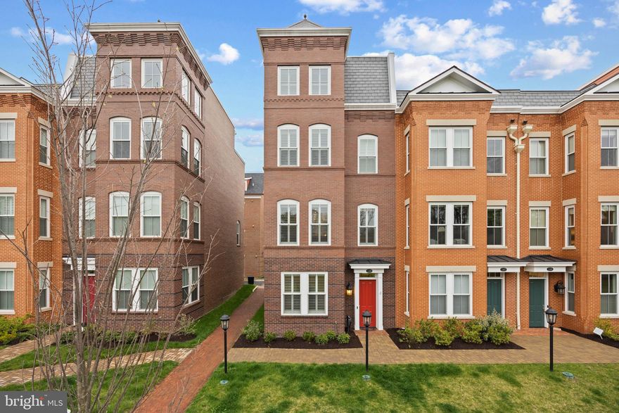 END UNIT ALL BRICK Luxurious 4-level TOWNHOME WITH ELEVATOR!!! 3 bedrooms + main level office, and 3.5 baths located in the hip North End of historic Old Town Alexandria! Built in 2022 by Madison Homes this Montgomery model is one of the largest in the community at 2,573 finished square feet.  Featuring 9 and 10 ft ceilings, gorgeous Andersen windows (some with transoms!) 2-car garage parking and wood floors throughout the entire home. Rare elevator even stops at all 4 levels of the home!! Stunning white chef's kitchen with large island and waterfall quartz countertops with oversized subway backsplash. High end Miele appliances including paneled front fridge and dishwasher, 6 burner gas range, additional electric wall oven, microwave and filtered water at kitchen sink.  Sellers have spared no expense in additional upgrades in this home including technology (Sonos 3 zone in-ceiling speakers, security, wifi and more), converting one en-suite bathroom tub to a beautiful walk in shower with frameless glass shower door, ceiling fans in each bedroom, wood plantation shutters, custom Shade Store window treatments and more! Each of the 3 bedrooms includes an attached en-suite bathroom and large closet.  The primary bedroom features 2 closets and bathroom offers a dual sink furniture grade vanity with quartz counter and marble tile spa-like shower with 3 shower heads including rain shower and beloved bench!  The amazing roof top deck offers a gas line for grilling and gorgeous roof top views. The end unit offers additional windows and thus more natural light throughout the home!  Tankless hot water heater + 2 zone HVAC. This boutique community also offers 6 guest parking spaces! If location is your primary concern than you have found the perfect home!!  Located just steps to the 11Y bus, 2.5 miles (7 minutes) to DCA Airport, 0.9 miles to Braddock Road Metro and 4 blocks to the Potomac River.  Dining out?  You'll find Sisters Thai, Hanks Oyster Bar, Oak Steak House and the new MacMillan Spirit House all within 2 blocks. Guests coming to town and you want them to stay elsewhere?  You are 1 block to the brand new Hotel AKA!  Grocery Shopping?  Harris Teeter is 3 blocks and Trader Joes is 5 blocks.  Stroll to Montgomery Park for the farmer's market (and bring your dog to the dog park there!) or to Oronoco Bay Park for a scenic walk along the river! And as if that wasn’t enough to make this elevator townhome your dream home - the house is located just 2 blocks from the 18 acre Potomac River Generation Station which, once redeveloped, will transform North Old Town into the greatest waterfront community in all of the DMV.