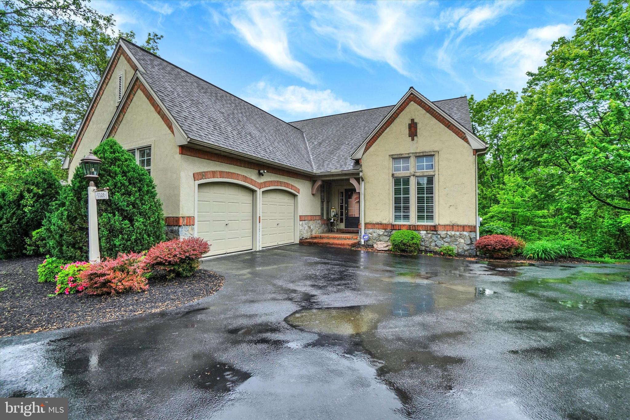Welcome home to this immaculate and updated carriage style condo in beautiful Versant at Pinehurst. One-level luxury living awaits you with over 4,000 square feet of living space. Through the front door is beautifully finished hardwood flooring that flows through much of the main level. The updated custom kitchen is a chef’s dream with beautiful and bright 42” cabinetry, new stainless-steel appliances including a 6-burner gas cooktop with beautiful hood, new quartz countertops and tiled flooring and backsplash. The eat-in kitchen opens to a beautiful sunroom with floods of natural light, the ideal spot for reading a good book or bird watching through the many windows. The spacious family room with sprawling ceiling, lovely tiled gas fireplace and a wall of windows is the perfect gathering spot for family and friends. Grab your morning coffee and step outside onto the new composite deck that overlooks a thick tree-line, great for watching the deer and birds. You’ll love entertaining in the spacious dining room with vaulted ceilings, just off the kitchen. Offering a wonderful respite is the large primary suite with lovely hardwood flooring, tray ceiling and 2 walk-in closets. The primary bathroom boasts a large soaking tub, walk-in tiled shower, new tiled floor and new his and her vanities. A living room with new wainscotting and tile flooring, completely updated half bath and mudroom with laundry complete the main level. Upstairs is a wonderful loft area, perfect for a library, playroom or craft room. 2 additional bedrooms provide plenty of room for guests, and the full bathroom has been updated beautifully with new tiled flooring and new large vanity. On the lower level, you will find an entertainer’s dream. A huge rec room awaits you with a large bar area for guests, a great place for parties or watching football with friends and family. When you need a breather, step outside to a lovely stamped concrete patio. Off the rec room are French doors leading to an additional game room with pool table (that will stay) or can also be used as an office space or playroom. Need more space? There is an additional finished room that would make a great home gym or additional bedroom! Storage is not a problem, with a large unfinished area in the basement for all your treasures. This home has been updated and meticulously maintained and includes wonderful additional features like speakers throughout most of the home, lots of crown molding, a whole house generator, new water heater, convenient recess lighting, electric blinds in the family room, custom plantation shutters and tons of windows throughout for natural light. This home is located near shopping, restaurant, parks, main highways, and is a joy to own!