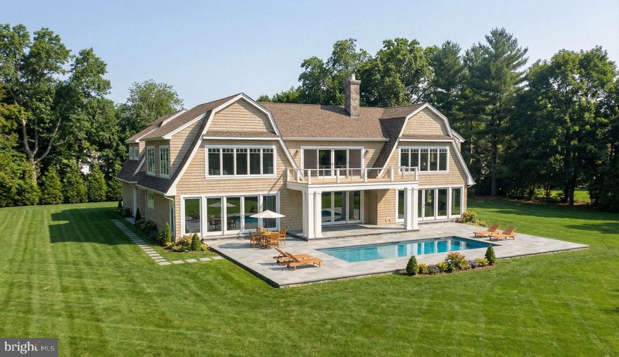 Envisioned for a premier waterfront setting along the Tred Avon River, this exceptional TO-BE-BUILT coastal residence presents a rare opportunity to create a refined Eastern Shore retreat on a remarkable 4.18-acre homesite within the exclusive Morgan’s Point community of Oxford. Thoughtfully designed in classic shingle-style architecture, the proposed home is perfectly oriented to capture sweeping river views, abundant natural light, and a seamless connection between indoor and outdoor living.

The proposed floor plan balances timeless elegance with everyday comfort, featuring open yet well-defined living spaces that flow effortlessly toward the waterfront. A chef’s kitchen anchors the main level, opening to inviting gathering areas and expansive terraces overlooking the river. Walls of glass frame the ever-changing water views, while a main-level bedroom suite offers flexibility for guests or convenient single-level living. The upper level is designed as a private retreat, highlighted by a serene primary suite with elevated river views and additional bedrooms thoughtfully arranged for family and guests.

Outdoors, the concept plan showcases a resort-inspired setting with a waterfront pool, generous patios, and sweeping lawn leading to approximately 389 feet of rip-rap shoreline. Boating, paddleboarding, and relaxed days by the water are central to the lifestyle this property affords. The lot is fully usable, offers ample mean low water depth, has an approved perc, and does not require flood insurance, making it an ideal canvas for a custom estate, family compound, or legacy retreat.  Lot can be purchased separately for $2,250,000 (MDTA2012470)

Set within the natural beauty and refined charm of Talbot County, and just moments from the Chesapeake Bay, this extraordinary offering combines privacy, scale, and location. A rare chance to bring a bespoke coastal vision to life on one of the Eastern Shore’s most desirable riverfront parcels—perfect as a year-round residence or second-home sanctuary.

Located in the tranquil town of Oxford, this estate offers privacy and serenity while remaining conveniently close to shopping, dining, entertainment, medical facilities, and the Chesapeake Bay. Major commuter routes provide easy access to Washington, DC; Northern Virginia; Annapolis; and Philadelphia, with four major airports: BWI (71 miles), DC (74 miles), Dulles (112 miles), and Philadelphia (113 miles). Embrace the Eastern Shore lifestyle and live the Bay Life in unparalleled luxury!