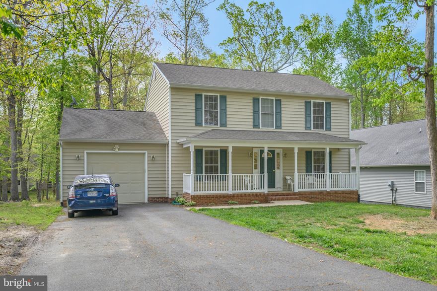 Welcome to 207 Saylers Creek Road in amenity-rich Lake of the Woods, where you can enjoy the inviting front porch to relax and enjoy the serenity of your new home, located on a quiet cul-de-sac!  Once inside, you will love the light filled, expansive family room, spacious kitchen with oodles of cabinet and counter space, large dining area, and pantry.  The main level also boasts flex-space that could be used as an office, dining room, or bedroom off of foyer, complete with french doors.  The master suite is gracious in size, with an extra little nook and en-suite master bathroom.  Two additional bedrooms complete the upstairs with a dual entry full bath.   The deck, located off of the kitchen, leads to a private, level back yard perfect for gardening and enjoying outdoor activities. A private, gated, secured community, Lake of the Woods offers anything and everything you could possibly want. Home to two lakes (the 550 acre main lake and a 35 acre "fishing lake"), a golf course, an equestrian center, a fire and rescue department, and a church all within the gates, Lake of the Woods simply has it all. Whether your passion is boating, water skiing, kayaking, golfing, horseback riding, or simply taking in the breathtaking views from the clubhouse while enjoying a fabulous meal, from your own deck or yard, or from one of the beaches, you won't be disappointed! Perhaps you'd like a game of bridge or volunteering your time and talents...Lake of the Woods offers more than 60 clubs and/or organizations from which you may choose to become involved. Located in Orange County, we are fortunate to enjoy low real estate taxes. Coupled with home prices ranging from $150,000+ to over $2,000,000, Lake of the Woods is the perfect community for both full-time residents, as well as weekenders. But don't take my word for it, please come see for yourself! I will gladly give you a tour of Lake of the Woods by boat and by car so that you may experience why I love Lake of the Woods!
