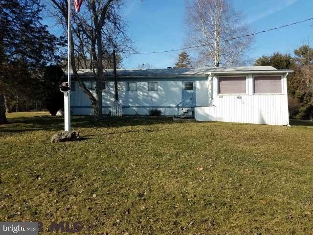 Great place to put a doublewide, modular home or living in the mobil and build your new home when you can. Public water, electric and sewer already on the 1.02 acre lot. Visit Virtual Tour at http://rem.ax/2neIsDR