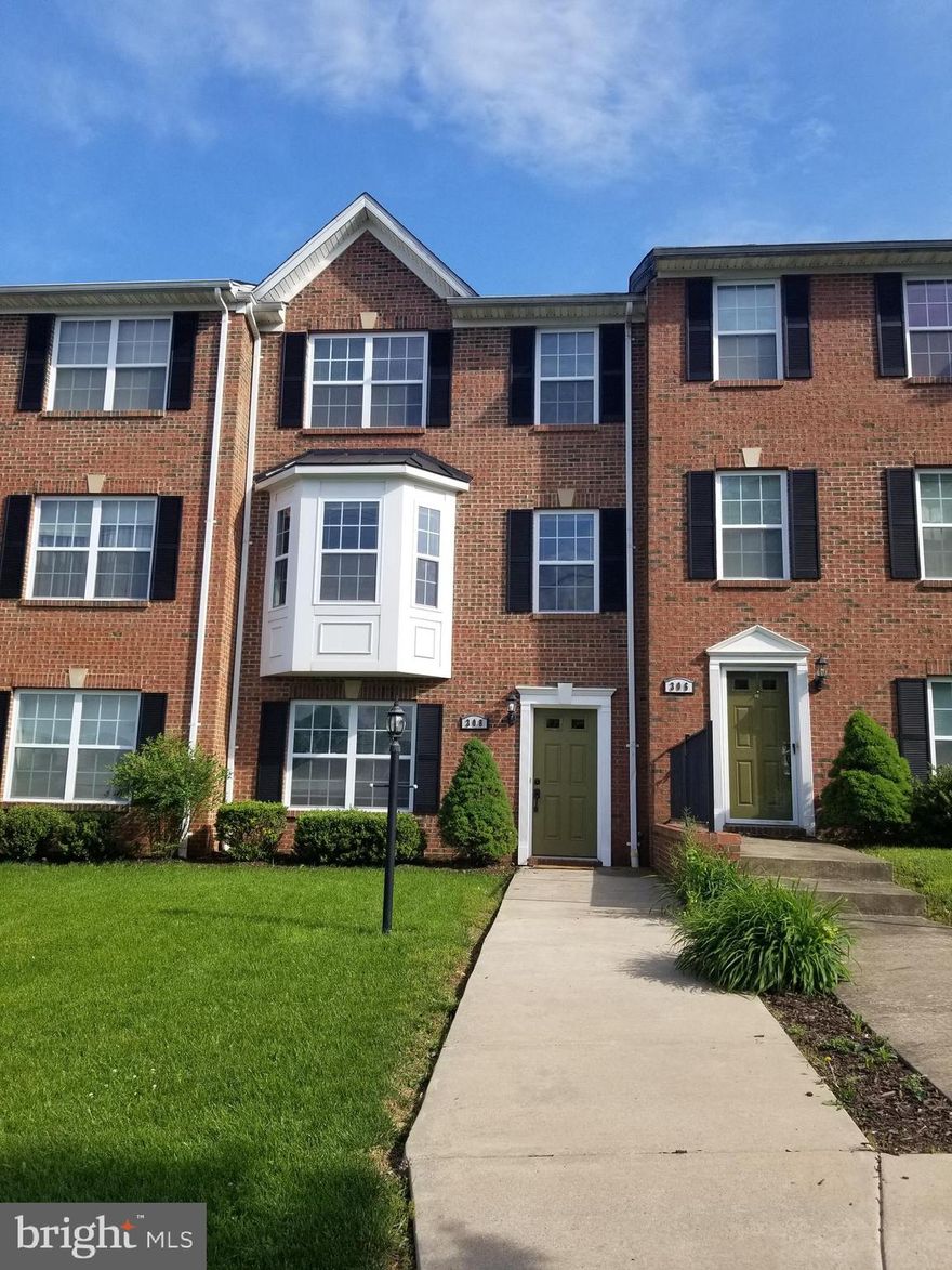 Lovely brick front townhome features spacious living room/open kitchen on main level, finished family/    rec room & laundry/mud room on lower level. Bump-out Bay window, ceiling fans, recessed lighting, Paved driveway, attached 1 car garage.  Located within walking distance to restaurants, shops & Hollywood Casino. HOA maintains lawn.