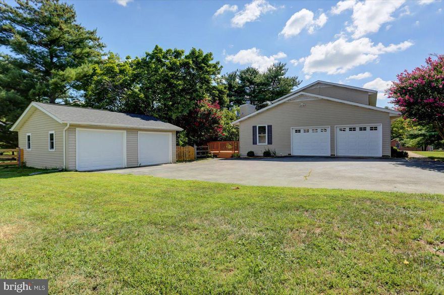 Lovely 4-Bedroom Center Hall Colonial home set on 2-Acre lot with fenced backyard. 
List of Upgrades: **HVAC upgrade - 2020. **Compressor outside and furnace inside were replaced, **upgraded from 3 ton to 4 ton unit. **Siding, roof, gutters and garage doors - replaced in 2018. **Fridge - replaced in 2022. **Fence gate and various fence posts replaced in 2023. **Deck stained in 2022, **gates were also added at the same time, as well as a hand rail. **The well tank in the utility room (its blue) and the conditioning/salt tank were replaced at the end of 2020, **New carpet in Family room (with fireplace) 2022, **crawlspace was encapsulated (Helps with heating/cooling) 2022
Home has 2 car attached garage and an additional 2 car detached garage.  Family room with fireplace has door to 2 level deck in back. Large living room off center hall has French doors. Large kitchen with Corian counters and sink, Separate Dining room.
Basement has full bathroom, and doors to walkout to the backyard.  Come check out this great home
Seller offering a $5,000 Credit for carpet and paint with acceptable offer
