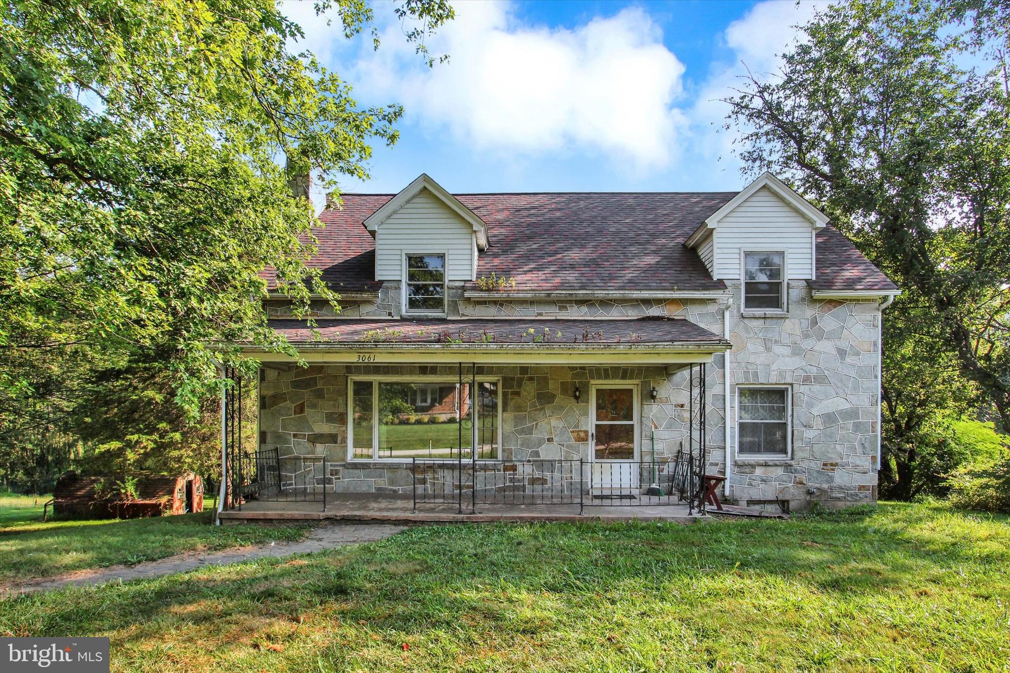 One of a kind: A stone Cape Cod on FOUR acres in Codorus Township! Most of the land is level and clear, with road frontage and possible future subdivision potential; the back of the property is wooded with a park-like feel and backs to the York County Heritage Rail Trail for your enjoyment, which is super convenient because the township advises that you can have horses... Unlimited riding potential!
The home was quality built with a brick foundation and even a storm cellar. Features a stone fireplace in the living room, cedar closets (one with a laundry chute), and a back deck to enjoy nature. Come and make it your own.