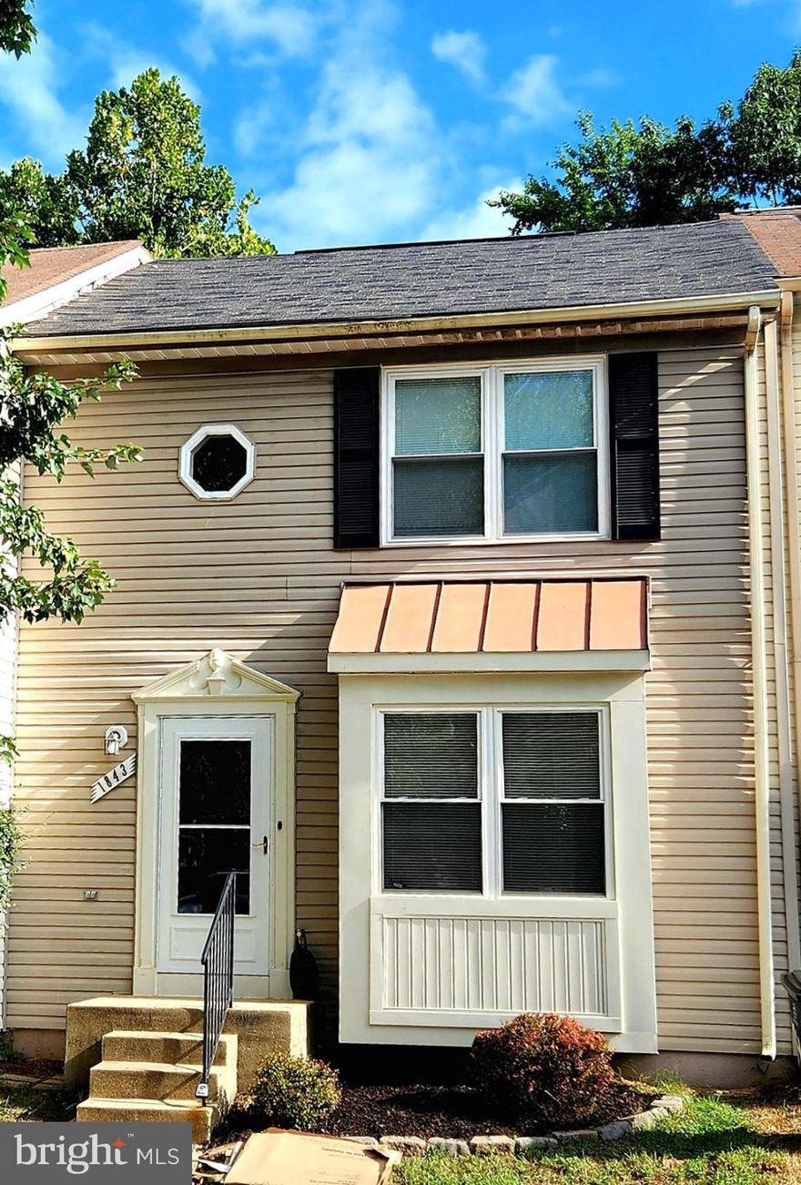 Reduced! Updated three-level townhouse, featuring three bedrooms and three and a half bathrooms. The very functional and cozy kitchen features stainless steel appliances, and the dining area leads out onto a deck that is perfect for entertaining. Three finished levels with a rec room and full bathroom in the basement. Home is freshly painted.