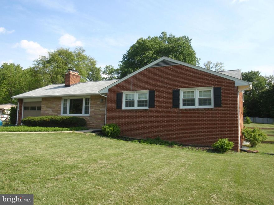 This all brick home has been almost totally remodeled. Featuring over 2600 finished living space. One car garage, hardwood floors, remodeled baths and kitchen, kitchen with ceramic floors,granite counter tops and new cabinets,two master bedrooms, 2 brick fireplaces, large fenced yard, 1 acre lot, near all major routes. Pets case by case, no smokers, all disclosures and applications are on MRIS.