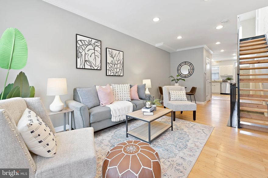 Beautifully renovated Canton home with parking pad! Hardwood floors throughout, crown molding, open stairs with wrought iron rails, recessed lighting, storm door and replacement windows. Powder room on entry level. The kitchen boasts white cabinets, granite counters and stainless steel appliances. Upper level has two bedrooms and a large bathroom with soaking tub and stand up shower. Lower level has a finished family room area and laundry/storage room. Roof is less than 5 years old and basement has been waterproofed.