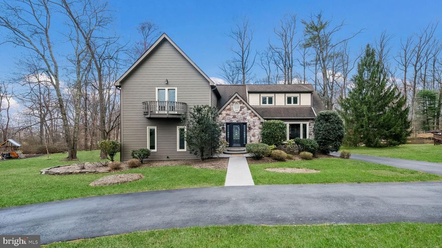 For the discerning buyer seeking a spacious lot with privacy, this stunning home is your future retreat. This stately 4-bedroom, 2.5-bath Colonial boasts nearly 3,800 sq. ft. of living space. Step into the impressive entry foyer, where a grand circular staircase sets the tone for elegance.

The expansive, remodeled kitchen features custom cabinetry, granite countertops, a built-in cooktop, double oven, and a large pantry. Open to the inviting family room with a central fireplace, it’s perfect for both everyday living and entertaining. A versatile bonus room on this level offers endless possibilities—convert it into an in-law suite, game room, gym, or home office. A formal living or dining room off the kitchen provides additional space for gatherings.

Upstairs, the oversized master suite is a true retreat, complete with a private, updated bathroom. Three additional generously sized bedrooms complement the second floor, along with a landing area that can serve as a cozy sitting nook or study space. A second full bath with a washer & dryer hookup is conveniently located in the hallway, with an additional hookup available in the basement.

The lower level offers a finished space, a large storage area, garage access, and an additional room—currently used as a gym. With a Hardie Plank exterior, updated windows, and modern upgrades throughout, this home is move-in ready.

Set on over half an acre backing to open space, this property is a nature lover’s dream. Relax on your deck and enjoy the peaceful sounds of birdsong—a private oasis just waiting for you to call it home.