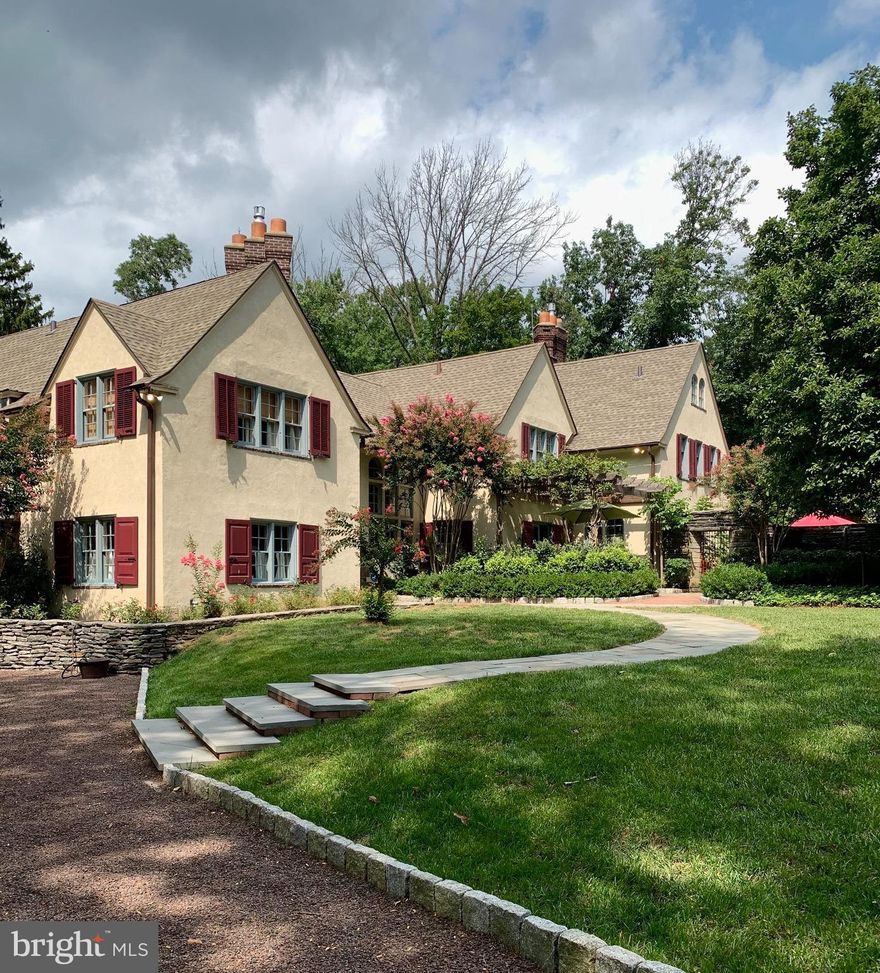 Welcome to 'Cogshill' -- A truly exceptional property on the Chestnut Hill/West Mount Airy border.  Walled and gated this is a very private and gorgeous oasis in a premier location. Steeped in history, this stately 5 BR/3.5 BA mini-estate was built in 1915 for the notable artist, Jessie Willcox Smith, on a one-acre parcel of land that she purchased from George Woodward.  She subsequently commissioned renowned Philadelphia church and residential architect, Edmund Gilchrist, to design her house. The heart of 601 Saint Georges Road is a stucco-on-stone house with attached bluestone and brick garden courtyard, front patio, and back terrace. These provide vantage points to the recently hardscaped and landscaped property of extraordinary trees, shrubbery and plantings.  The completely private Roman End built-in pool is set among new gardens of hydrangeas, crape myrtle, azaleas and evergreen trees. Enter into the foyer to a grand mahogany stairwell leading up to a balcony library and a gorgeous 2-story beamed ceiling.  All 5 bedrooms, one with a fireplace, are on the second floor. These rooms can easily be transitioned for other uses as well. 3 full bathrooms and a screened porch are part of the second floor as well. Superb classic woodworking throughout the house including mantels, sills, doors, beams, staircases, trim and cabinetry. The main floor living room and plant-filled garden room is memorable as you also see the back terraces and side yard garden through multiple sets of French Doors. The classic country kitchen is well-designed with stainless steel appliances and porcelain farm sink; the dining room and Butlers pantry perfectly placed for entertaining. Finally, the spectacular artist's studio, replete with 12' ceilings, grand fireplace and mantel, ceiling-to-floor cabinetry, amazing acoustics and garden views is perhaps the most dramatic room. This historically rich home, known originally as 'Cogshill', is meant for those who want all the seasons of the year to be filled with grand color, beauty, refinement, and an inspired quality of life both inside and out.  New septic system is being installed. Easy access to the train, Center City, major highways and the suburbs.  Truly exceptional.