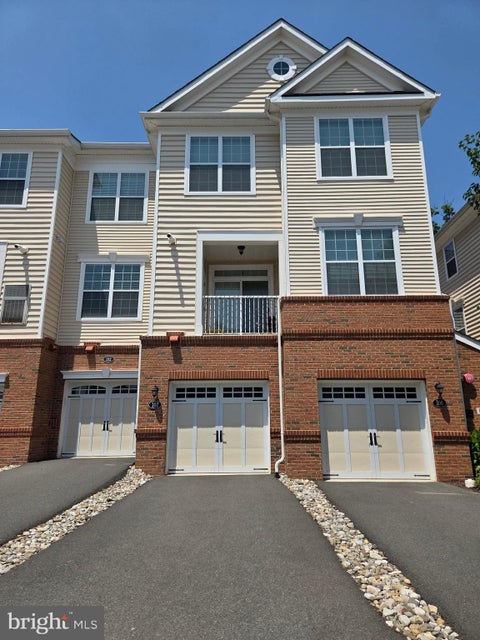 Photo of 23235 Milltown Knoll Square #107, ASHBURN, VA 20148 (MLS # VALO2130020)