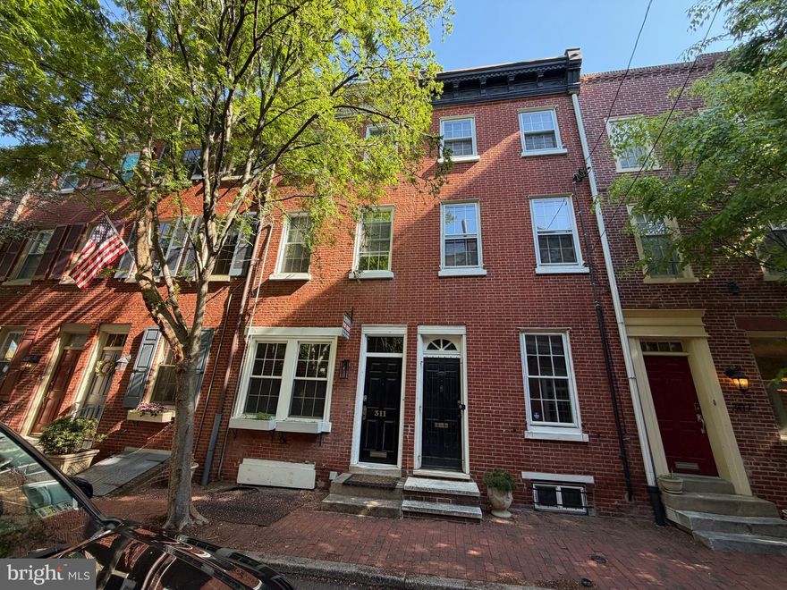 Welcome to 311 Gaskill, a light-filled home on one of Philadelphia's most picturesque blocks.  This beautiful home is fully renovated.  The first floor offers a spacious living room with exposed brick wall,  high ceiling w/recess lighting t/o,  beautiful marble tile flooring  & wood burning fireplace.   Modern kitchen with ss appliances, hand crafted wooden display shelve & plenty of cabinetry.  From the kitchen enter to the formal dining room with tons of natural lights from the huge sky light & exit to the rear yard.  The second floor offers a large light-filled bedroom with custom shelving and built-ins, and a large walk-in closet.  A modern 3pc hall tile bathroom and exit to the large rear deck.  The Third floor offers a huge master bedroom & a modern hall bath with custom tiled shower.  The basement offers plenty of storage area, laundry area w/half bath.  Property is conveniently located, close to restaurants, shops & transportation.   Schedule your appointment today!