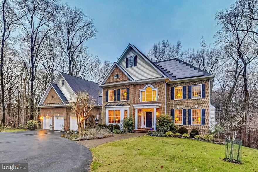 This elegant, 4 bedroom updated Colonial is located in the coveted Quaint Acres development of 1-acre lots.
You enter the home through the central 2-story foyer with a curving stairway to the second floor.  The formal living room is to the right.  The large dining room is to the left.  Ahead is the family room with ample space for relaxed entertainment activities around a stone hearth.  Off the family room is a powder room, an office/den, which could be a first-floor bedroom, if need be.  To the left is the huge kitchen with an island cooktop, over 30 feet of granite counter, cherry cabinets, and space for casual dining.    Plenty of windows throughout and high ceilings fill these rooms with light.  From the kitchen, exit to the 20-foot screened porch with lighting, ceiling fan and forest view.  Also from the kitchen, there is a laundry room, another half-bath, and entry to the 3-car garage.

Upstairs are 4 bedrooms.  The large master suite includes the bedroom, a sitting room, dressing room, 2 walk-in closets, and bathroom with large tub and glass-enclosed shower.  Again, multiple windows admit plenty of light and give a view of the woods and stream below.  Three other bedrooms include one with en-suite bath, and the other two share a Jack and Jill style bath.  All bedrooms are generously sized.
On the lower level you will find an in-law studio, with bedroom, sitting room/kitchenette, full bath and a ground level exit to the patio.  There is also a large exercise/playroom with cork floor, and an additional carpeted Rec room, including craft center.  Plus an unfinished utility area with more storage.

The grounds are extensively landscaped with dozens of mature azaleas, blooming dogwoods, and perennials, as well as a cherry tree and crepe myrtle and rhododendrons.  There is a large garden shed.  This house has a 3-car garage, plus an outside parking apron.  There are solar panels on the roof.
There is dual zone HVAC, gas for the main level, and heat pump up.  Two gas fireplaces, gas cooktop and water heater, 2 dishwashers, double oven, and everything one would expect in a home of this distinction.  Approximately 6000 sq ft of finished space. Convenient to shopping, 2 miles to Beltway via Colesville Road, or New Hampshire Ave, 1 mile to FDA, 4 miles to Silver Spring metro (redline) by car or Express bus.