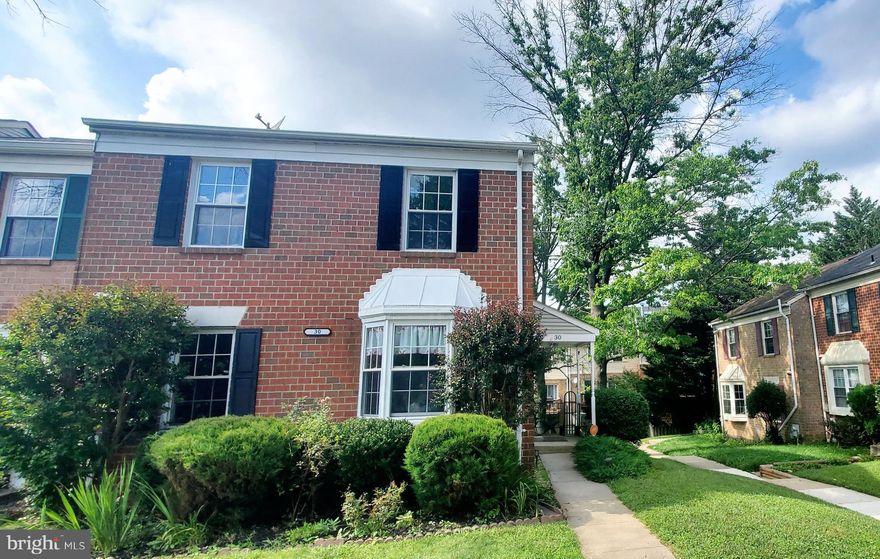 Beautiful and very spacious brick end unit with a private side entry, Hardwood floors, Large formal living room with a Large separate dining room. 4 bedrooms and 3  1/2 baths, Walkout and fully finished lower level with fireplace.  Available immediately!