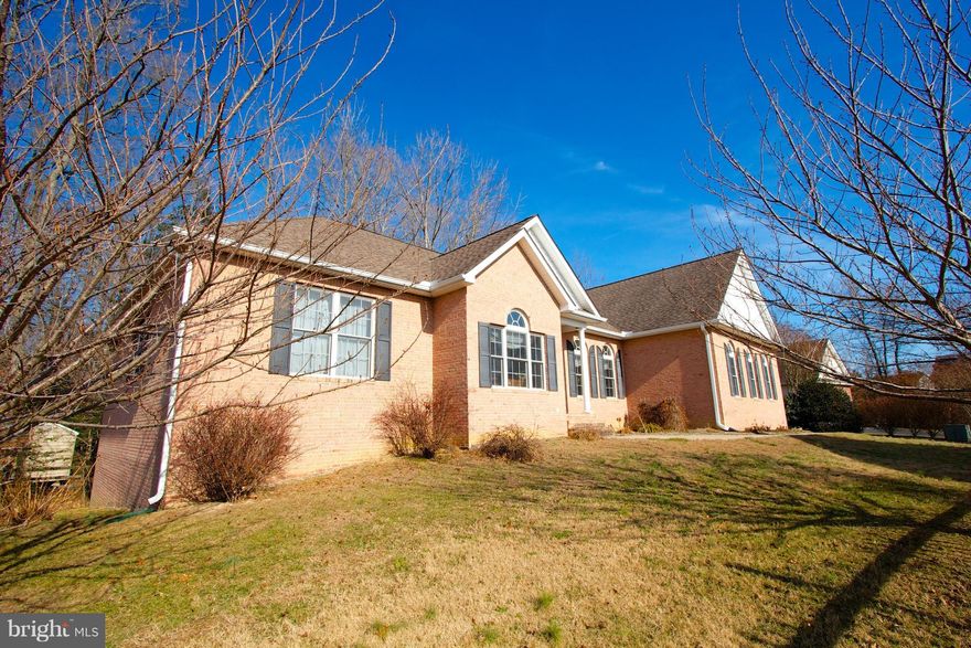 Beautiful custom home in the heart of Leonardtown. Currently in the process of getting new carpet and paint touch up's! Complete with hardwood flooring, upgraded cabinetry, fireplace in master bedroom and in family room, full finished bathroom in the basement and more!  Extra windows in basement make for optimum lighting! This home is a must see!