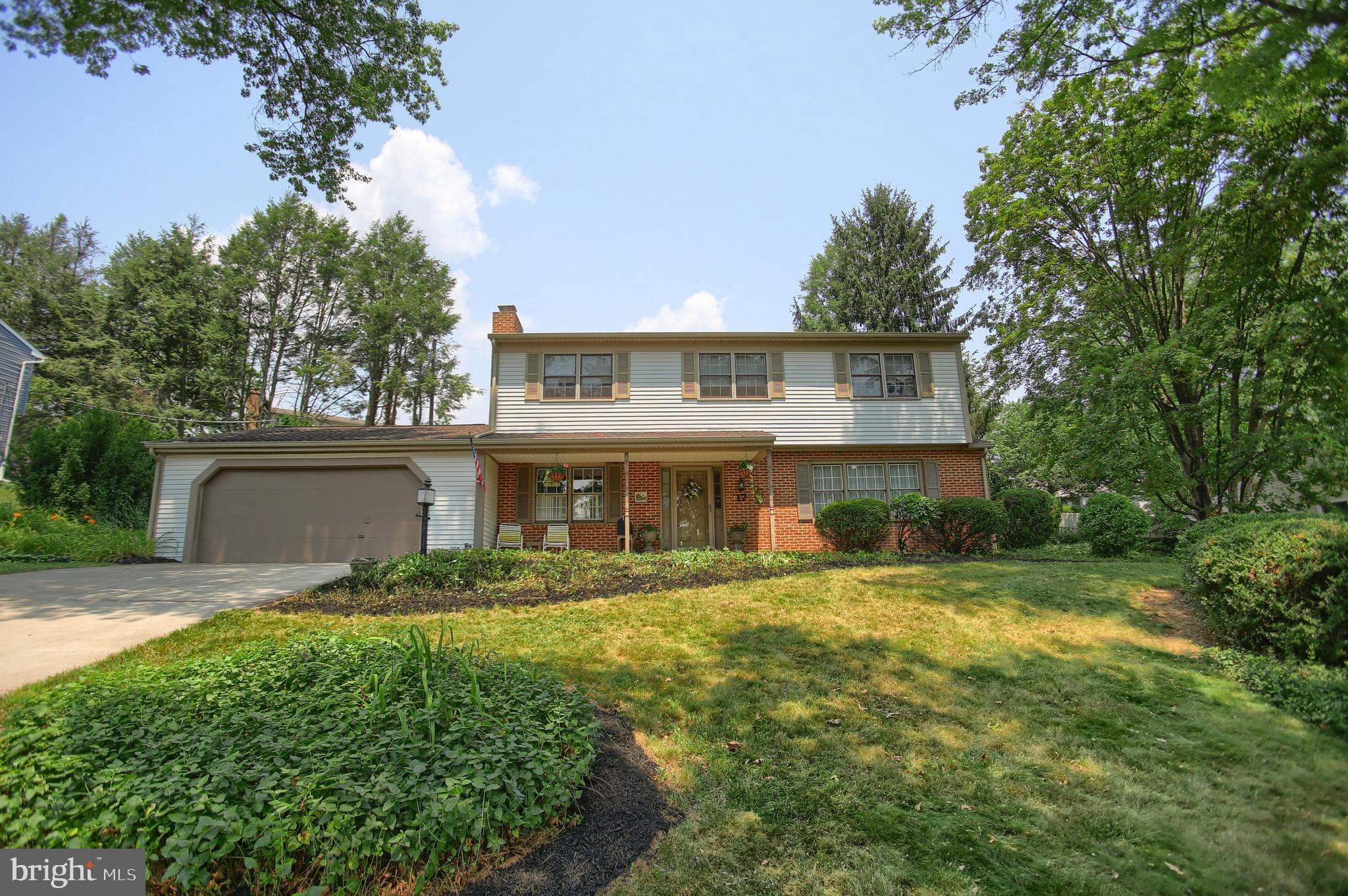 Impeccably kept and maintained Green Lane Farms charming 2 story traditional w/ in-ground pool!  Beautiful red oak hardwood flooring though-out.  Main level laundry and mud room.  Updated kitchen with granite counters.  4 generously sized bedrooms, including a master bedroom with adjoining full bath.  Wonderful outdoor living, entertainment and enjoyment opportunities with screened-in 3 season room, large paver patio and sparkling in-ground pool.