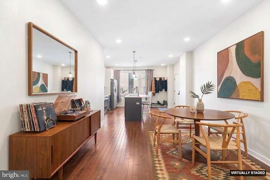 Step inside 1640 N. 5th Ct unit #29A. Cozy, tranquil, and effortlessly livable. Unit #29A is a home that invites you to slow down and stay awhile. Hang your coat, kick off your shoes, and let the warmth of the hardwood floors welcome you home. Glide into the kitchen to grab a quick snack, where marble countertops, a spacious island with storage, pendant lighting, and stainless steel appliances make everything feel easy and elevated. Soft-close shaker cabinets and a pantry keep life effortlessly organized.

Maybe you put on a record, letting your favorite album fill the space as you settle into your cozy couch. The open, airy layout gives you the freedom to design the space your way, whether that’s a laid-back lounge, a dining setup for hosting, or a creative mix of both. It’s a space that adapts to your rhythm.

When you’re ready to unwind, head downstairs to your quiet retreat. Two spacious bedrooms offer flexibility for whatever you need, a restful sanctuary, a guest room, a home office, or space to share. Ample closets, continued hardwood floors, and a full bath with tub and shower create a calm, comfortable escape. In-unit laundry and a separate storage room add to the ease of everyday living.

Outside you'll find a shared courtyard, offering a peaceful pocket perfect for slow mornings, fresh air workdays, or relaxed evenings with friends.

Set in Ludlow, just steps from neighborhood favorites like Human Robot and Luna Café, with the new bustling American Ave corridor, Fishtown and Northern Liberties all nearby. This pocket of the city is a hidden gem that keeps you close to everything while still tucked away. Easy access to I-95 and public transit makes getting around simple.