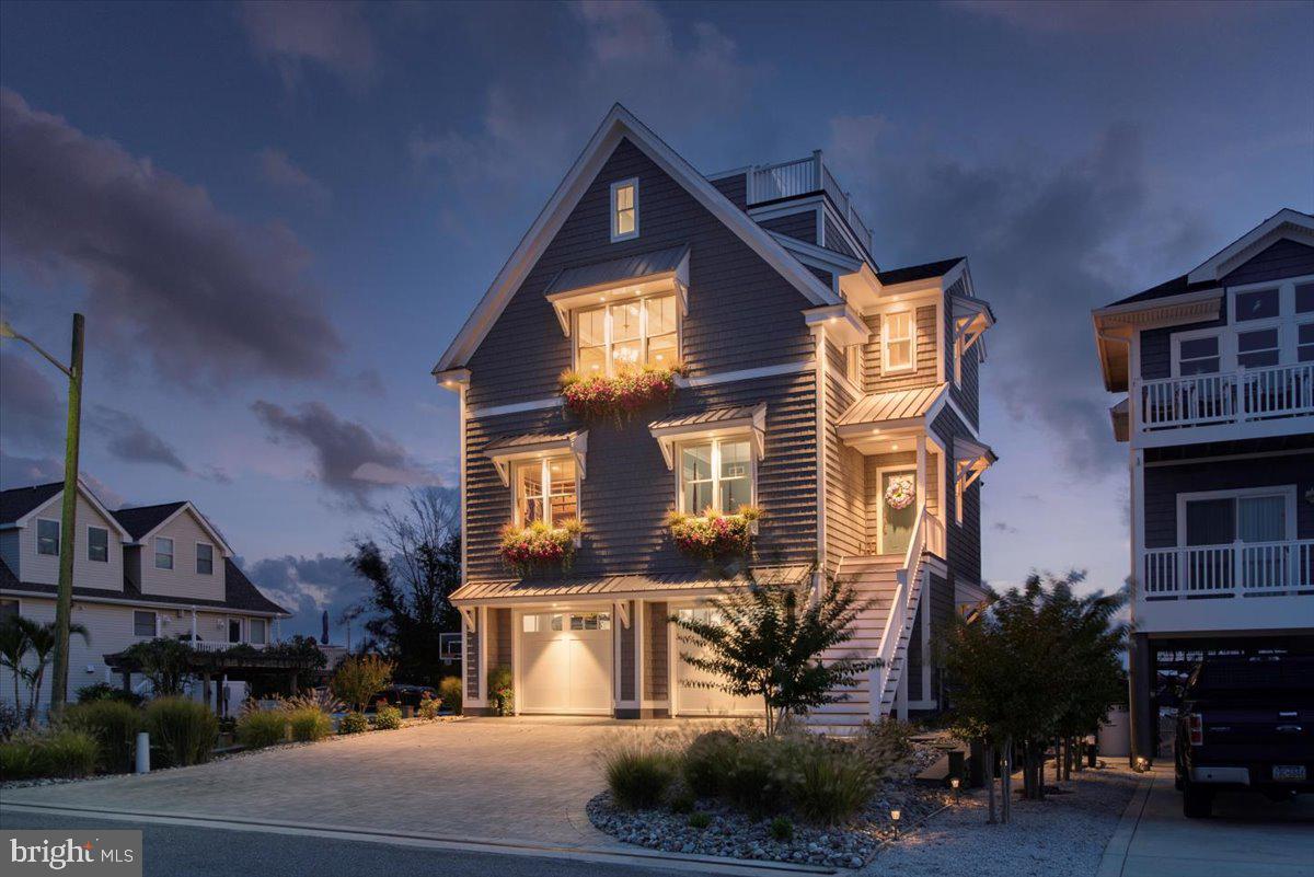 Nature abounds around this custom designed built Coastal Style Home by White Creek Homes Inc's OR White with craftsmanship and quality throughout. This waterfront home is located on the Tompkins Canal in the Snug Harbor community with breath taking views of the open bay, Atlantic Ocean, Assateague Island, and marshes. Dock your boat in your back yard with Inlet and ocean access are just 3 miles north with no bridges. Convenient peaceful location close to Assateague Island, Ocean City, and Berlin..