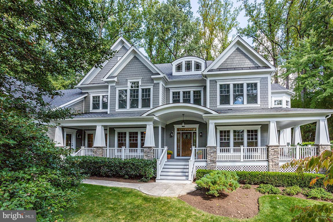Custom Arts & Crafts residence, beautifully nestled on a picturesque quiet Bethesda street in the Whitman school cluster. Designed by architect Scott Allen and built in 2009, this light-filled, open-floor plan and meticulously maintained home sits on a private 0.74 acre lot. Featuring gorgeous Gourmet Kitchen with large island, Butlers Pantry, elegant and spacious Living Room, Dining Room, Family Room w fireplace, Home Office, Guest-Suite and a mud room! Upper level features an elegant Master suite with fireplace, walk-in closet, and luxurious Master-Bathroom. Also, a wonderful covered porch off the master suite, the perfect escape to chill at the end of a long day! Two additional bedrooms, each with its own bathroom, and a connecting study room. Walk-out lower level features Rec Room with a full bar, movie/gym room, guest suite, ample storage, and another half bath. Beautiful landscaping all around makes spending time outside so pleasant on the covered wrap-around front porch, or the two additional covered back porches, or the flagstone patio! Lastly, a 3-car garage. So much value!