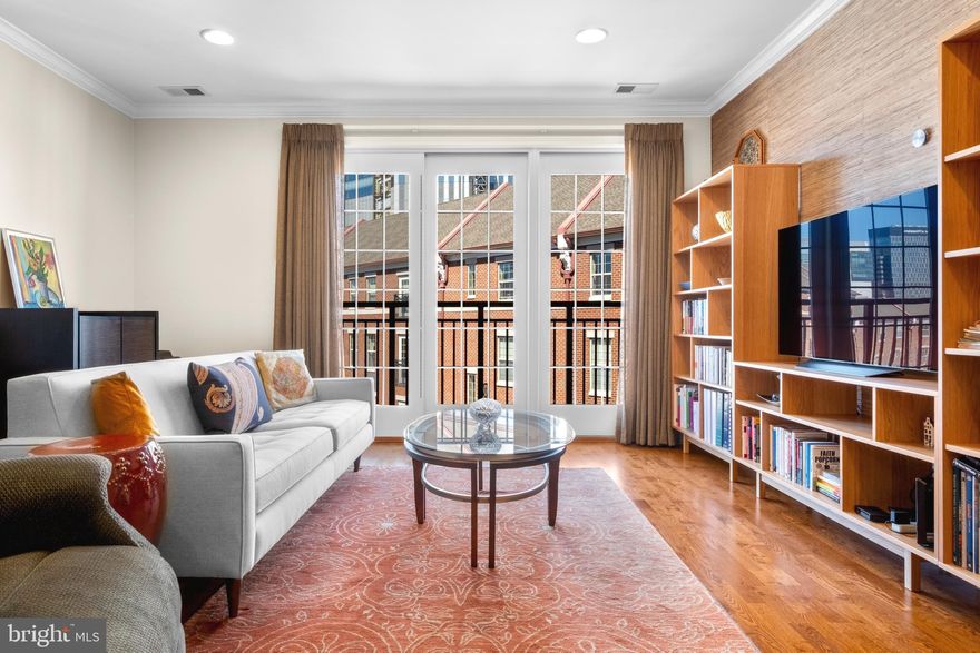 Incredible opportunity at Naval Square: Now is your chance to live in one of the most sought after buildings in the entire community- Pemberton Manor! This 2 bedroom, 2 bath + enclosed DEN features secure garage parking and a large storage locker. Meticulously maintained and full of sunlight, this spacious flat boasts almost 1,500 sq. ft. of living space all on one level. Enter the spectacular kitchen complete with cherry cabinets, built-in pantry, granite countertops & GE stainless appliance suite. Fantastic, open concept living/dining area features recessed lighting and gleaming hardwood floors. Enjoy plenty of sunshine through your triple Juliet balcony doors. The adjoining den is an ideal space for an office, but can easily be used as a nursery or guest bedroom since it is a fully enclosed room. The primary suite is luxurious. You will love how spacious it feels with two closets, including an oversized walk-in-closet. The ensuite bath includes dual sinks with granite counters, soaking tub, and separate stall shower.  The second bedroom is also spacious and adjacent to a second full bath featuring beautiful carrara marble & subway tiles. A separate laundry closet with side-by-side washer & dryer and practical coat closet, complete the space. Beautiful neutral paint, custom wallpaper, and hardwood floors grace the entire home. Large separate storage locker included in garage (3X6X9). Garage parking space is located close to the elevator and allows direct elevator access from the garage floor to your unit floor. 

Enjoy unparalleled convenience with the pool and state-of-the-art fitness center just steps from your building, and the concierge is located just downstairs from the unit to assist with your package delivery needs. The stunning community room in the historic Biddle Hall rotunda is an ideal venue for hosting private events. Take advantage of the outdoor amenities in the expansive 20-acre park-like setting, featuring picnic areas, beautifully maintained gardens, and mature landscaping. With gated entry and on-site visitor parking, both security and convenience are paramount. The location is unbeatable, offering close proximity to the South Street Bridge, UPenn (0.7 miles), CHOP, HUP, Drexel, Rittenhouse Square (0.9 miles), and Fitler Square. A vibrant array of restaurants and cafes, including Rival Bros Coffee, Friday Saturday Sunday (a James Beard Award winner), Ilalta BYOB, Pub & Kitchen, Southgate, Sabrina’s Café, and Loco Pez, are all within close walking distance. For grocery needs, the new Heirloom Market by Giant and South Square Market are just a block away. Directly behind the property, you’ll find seamless access to the Schuylkill River Park, featuring the award-winning Trail and Boardwalk, Markward Playground, tennis courts.  Do not miss your chance to live in Center City's premier gated community! June 15th start date. First month, last month and security deposit due at lease signing. $400 move-in/ out fee due to Mgmt. 2 weeks prior to move in.