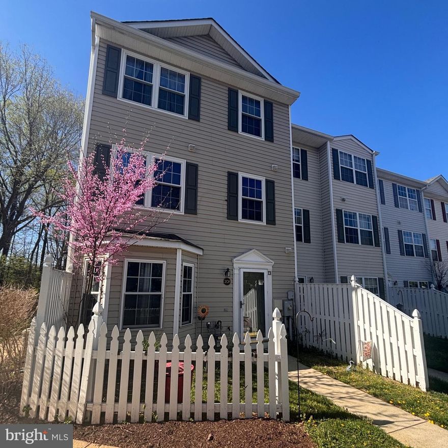 Beautiful end-unit townhome located in the desirable Annapolis Overlook community,
 featuring a sunny garden and charming white picket fence. This well-designed home offers an inviting open floor plan with spacious living and dining areas, a living room with a charming bump-out window, a well-appointed kitchen with pantry storage, and a convenient main-level half bath. Recent updates include a new kitchen floor, lightly used stainless steel gas stove, and stainless-steel dishwasher. The home also features bamboo flooring throughout the main level and a carpeted second level.

The second floor offers two additional bedrooms, a full hall bath, and a conveniently located laundry room. The entire third level is dedicated to a fabulous primary suite featuring bamboo flooring, a walk-in closet, and a spacious en-suite bath complete with a separate soaking tub and separate shower.

Residents enjoy community amenities including a pool and exercise room. Ideally located just minutes from downtown Annapolis and Quiet Waters Park, this home offers easy access to shopping, dining, recreation, and commuter routes. Conveniently located near Route 50 and I-97, commuters will appreciate easy access to both Washington and Baltimore while enjoying a peaceful community setting.