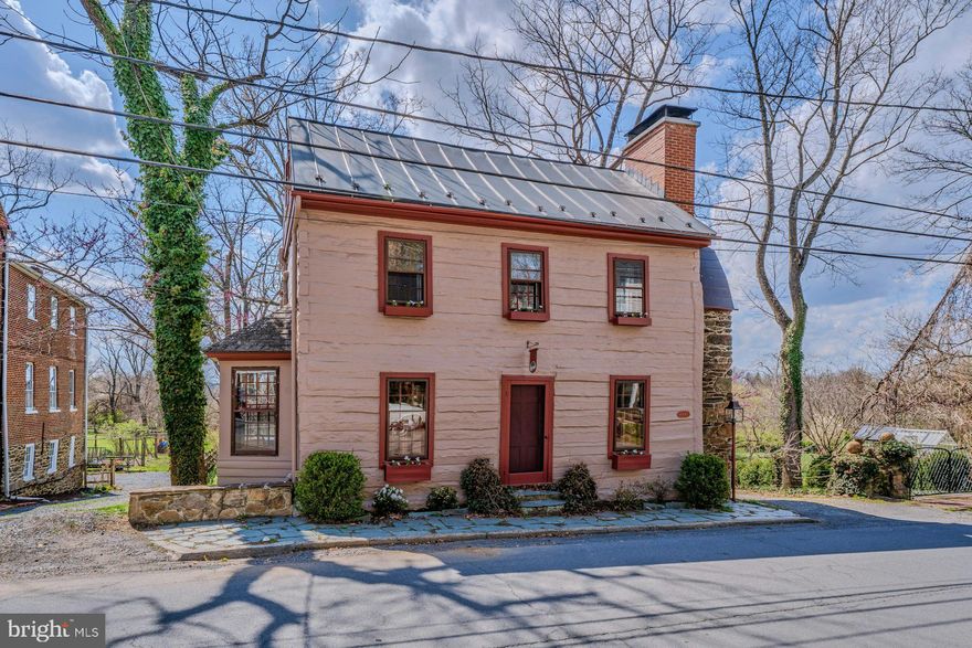 This meticulously maintained historic home in the heart of the Village of Waterford beautifully blends historic preservation with modern comfort. Featuring three working fireplaces, original floors, and preserved woodwork, the home exudes warmth and timeless character. The home boasts four finished levels of living space, two full baths, and the convenience of off-street parking. Thoughtful updates throughout enhance livability while preserving its historic charm.

An inviting back porch overlooks an expansive yard with mature plantings and gardens, bordering the 144-acre Phillips Farm, offering serene views, walking trails, and a peaceful creek setting. Please refer to the documents section for a complete list of upgrades to this charming home.