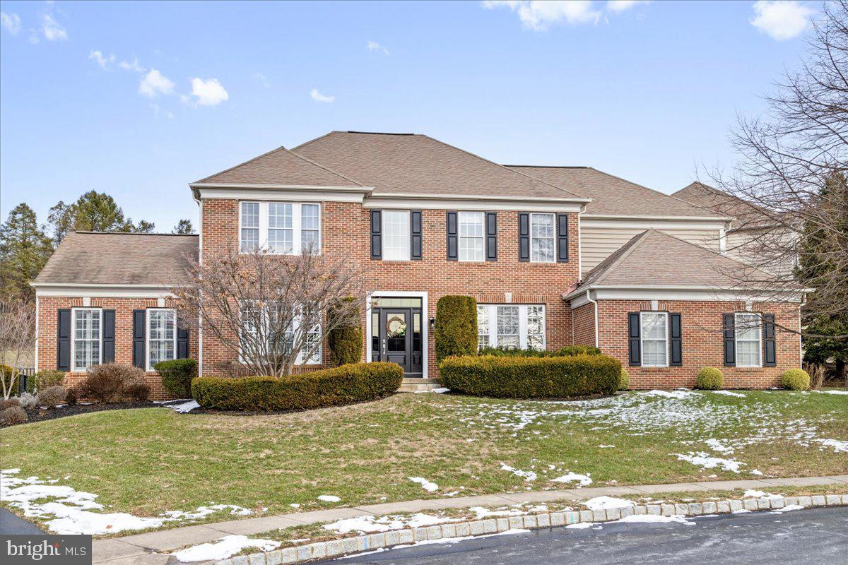 Welcome to 2208 Black Birch Lane, a spectacular residence in the highly sought-after Bridge Valley at Furlong community. Set on a tranquil cul-de-sac, this home offers some of Bucks County’s most breathtaking sunsets, best enjoyed from your front steps. Spanning nearly 6,000 square feet of finely finished living space, this exceptional brick home effortlessly blends modern luxury with timeless elegance. Step into the grand foyer, where soaring ceilings and newly refinished hardwood floors create a sense of sophistication that flows throughout the home. To your left, a charming living room leads into a sun-drenched sunroom with a vaulted ceiling, offering a peaceful space to relax and unwind. On the right, the formal dining room is ideal for entertaining, featuring custom built-in cabinetry and exquisite trim work. Through the butler’s pantry, the heart of the home is the chef’s kitchen, designed for both beauty and function. White cabinetry is complemented by striking quartz countertops and a seamless quartz slab backsplash, while the custom range hood and 48" Jenn-Air oven with a six-burner range and griddle will inspire your culinary creativity. The sleek refrigerator and dishwasher with custom paneling adds a refined touch, while the walk-in pantry will suit your organizational needs. High-end lighting extends throughout, including upgraded fixtures, recessed lighting, and under-cabinet illumination, enhances the home’s sophisticated aesthetic. The kitchen also boasts an elegant farmhouse sink, a large peninsula, and an oversized island with ample storage, all overlooking a sunlit breakfast area with walls of windows and plantation shutters. The adjoining great room is a masterpiece of design, featuring a two-story ceiling, expansive floor-to-ceiling windows, and a cozy gas fireplace framed by wainscoting. This light-filled space is perfect for relaxation and holiday gatherings. French doors lead to a bright and airy home office within earshot of your call to dinner. The first floor is completed by a stylish powder room, a mud room, and a laundry room, as well as access to the oversized two-car garage. Ascend the elegant formal staircase or use the convenient back staircase to the upper level, where the spacious primary suite awaits. This serene retreat features a tray ceiling, a custom-organized walk-in closet, and a newly remodeled spa-like ensuite bathroom with an oversized marble shower, a freestanding soaking tub, and a dual vanity with quartz countertops. Down the hall, two generously sized bedrooms share a beautifully appointed jack-and-jill bathroom with a tub shower, while the fourth bedroom boasts its own private ensuite bathroom. The fully finished basement is a standout feature, offering endless possibilities for recreation and togetherness. It includes a built-in kitchenette, a home gym, a rejuvenating sauna, and a spacious entertainment area. An additional bonus rooms and a sprawling storage area ensure plenty of space for all your needs. A full bathroom with a shower stall completes this lower level. Step outside to your private resort-like backyard for year-round enjoyment, peaceful and private in all four seasons. Entertain loved ones with the newer covered deck, a luxurious spa, and a custom paver patio, all surrounded by lush landscaping. This exceptional home is located within the esteemed Central Bucks School District, just a short stroll from Bridge Valley Elementary School. Don’t miss the opportunity to make this dream home your own. Call today to schedule your private tour!
