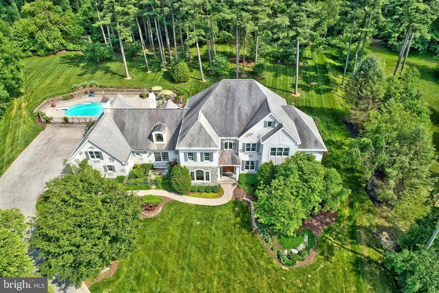 Unique opportunity to own a home of magnificence in a location that is truly one of York s most idyllic settings, situated on 4.56 Acres in a private distinctive cul-de-sac. An expansive open floor plan offers gracious living in every corner of the home while offering a perfect blend of character and architectural interests that is appealing to all of today s lifestyles. Custom millwork throughout, attention taken to every detail of this custom built, single owner home. Perfection is formed as you enter the two story 20 ft. Grand Foyer that opens to a formal Living Room with marble surround gas fireplace, Brazilian Cherry flooring and Formal Dining room with Tray Ceiling, Brazilian Cherry flooring and built-in china cabinets. As you proceed you will enter the French Doors to the ultimate Chef s Kitchen with top-tier appliances, space for multiple Chef prep areas that includes two Islands, two wall ovens and dining area; the perfect gathering space for entertaining, all overlooking the rear gardens through the wall of windows. The Great Room with soaring ceiling, the warmth of a gas fireplace with tile surround, floor to ceiling windows with remote control blinds, is the perfect area for guests to filter from the Kitchen. For further entertaining delight the Family Room has a dedicated full-size sub-zero refrigerator and full-size sub-zero wine refrigerator, both surrounded by built ins. The First Floor continues to a private office with built-ins and an additional Master Suite with a Sitting Area, Full Bath and oversized walk-in closet; perfect for in-laws, Nanny or Guests. The Upper Level with 9ft ceilings is home to the Master Suite with sitting area, Full Bath and oversized walk-in Closet. In addition to the Master Suite there are 3 additional spacious bedrooms on the Upper Level, an Exercise Room, gift wrapping/hobby room, cedar closet, 2 Full Baths, multiple walk-in closets and a full-size Laundry Room with built-ins. Continue to the Lower Level to discover a large Game Room with 8ft. ceilings, 2 large storage rooms, Full Bath and Pool Changing Room with a staircase to the rear gardens and in-ground pool area. The home is equipped with an updated internet link Sonos Sound System. An idyllic setting on 4.56 Acres in a private cul-de-sac, the gardens are a private park-like oasis all surrounding the amazing home with oversized salt water in-ground pool and exquisite landscaping. This home offers the perfect outside setting with patios and multiple areas for entertaining. A very private and exquisite setting. Minutes to I83, shopping, schools and hospitals all add to the unique and amazing qualities of this very special home.