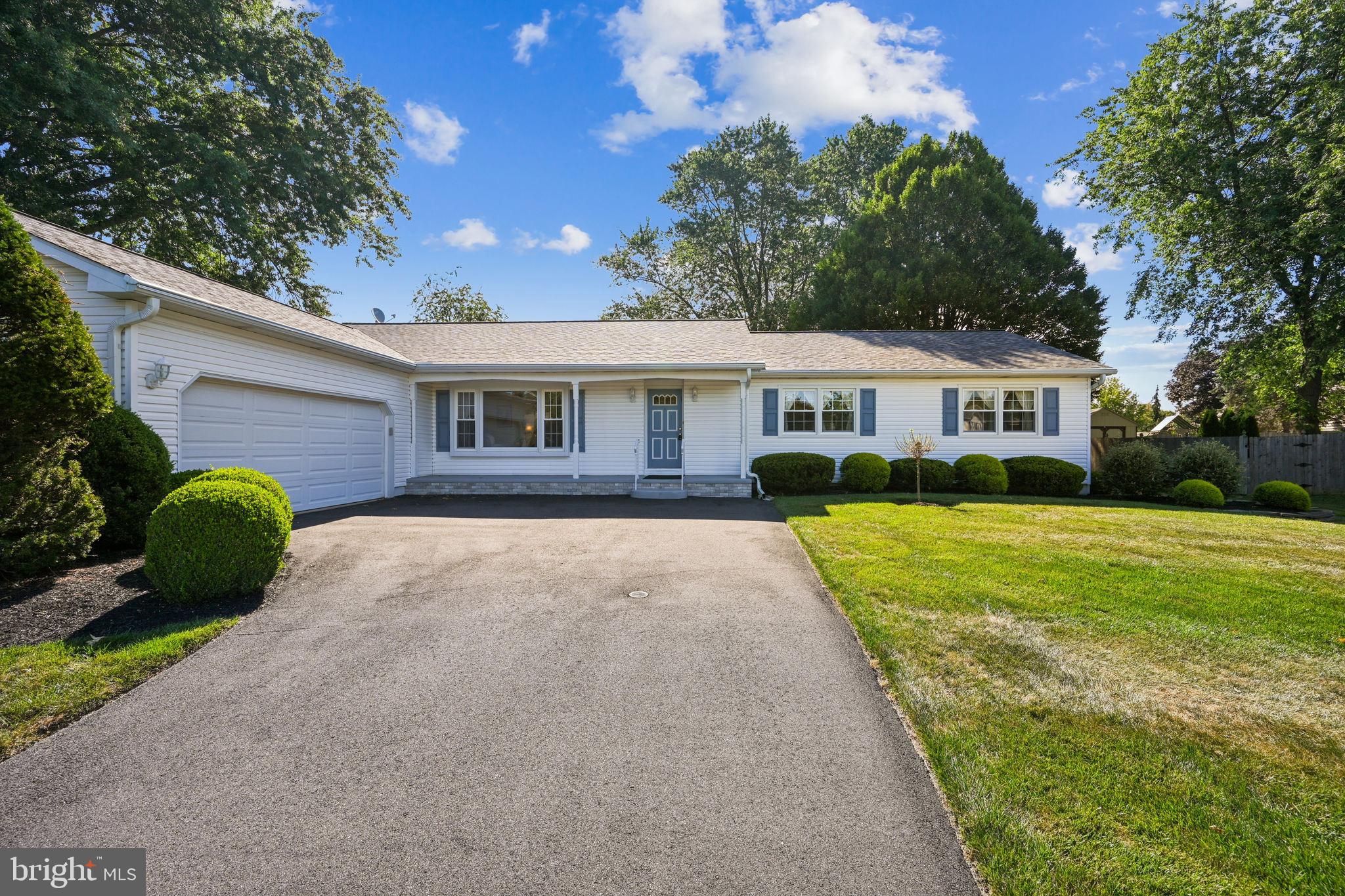 Tucked away in the welcoming Edgewood neighborhood, this classic ranch-style home offers the ease of single-level living in the highly regarded Pennsbury School District. Thoughtfully maintained, it features 1,932 square feet of comfortable living space with a layout designed for both daily life and entertaining. Step inside and you’re greeted by a spacious foyer adjacent to a bright living room, framed by a large bay window that fills the space with natural light. Straight ahead, the inviting family room is anchored by a cozy fireplace—the perfect spot for gathering with friends, enjoying movie nights, or relaxing with a good book. The formal dining room sits just off the kitchen and living room, It features sliding glass doors that lead to a screened-in porch. The screened-in porch being accessed from the dining room and the kitchen is a great place to enjoy insect-free al fresco dining. A wonderful eat-in kitchen benefits from a wood floor, granite countertops, upgraded warm wood cabinetry and has a functional peninsula style arrangement. There is a 'utility room' for additional storage as you head down the hall. This space was originally designed to house the washer and dryer, and could be converted back to do so, which would allow you to have a large double door kitchen pantry. The spacious primary bedroom features its own updated en-suite bathroom for comfort and privacy, while bedrooms two and three share a well-appointed updated hall bath. The large, unfinished basement offers endless possibilities—create a home gym, media room, play space, or keep it as exceptional storage. Set on a 0.32-acre lot, the outdoor space is ideal for gardening, play, or simply enjoying the fresh air. The oversized side-entry 2-car garage provides convenient parking and extra storage for hobbies, tools, or seasonal gear. Edgewood is known for its friendly atmosphere, tree-lined streets, and proximity to parks, shops, and commuter routes. Here, neighbors become friends, and everyday living feels a little easier. With its comfortable design, fantastic location, and room to grow, this ranch is ready to be your next home.
