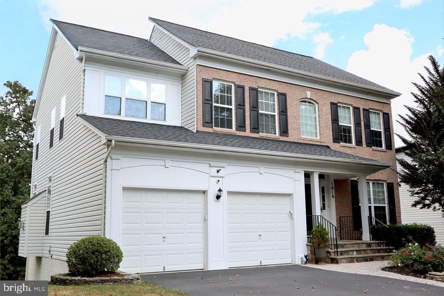 Beautiful Colonial Home in the Highly Desirable Edwards Landing Community. Spacious and tastefully updated 5-bedroom, and 3.5-bath. Step into a dramatic two-story foyer and enjoy gleaming hardwood floors throughout the main level. The bright and open family room offers a cozy gas fireplace and flows seamlessly into the large kitchen, which features granite countertops, a center island, dual wall ovens, and ample space for casual dining and entertaining. Step out onto the expansive deck and take in tranquil views of lush greenery and 10 acres of wooded common area with a peaceful stream, perfect for outdoor relaxation and privacy. Upstairs, the vaulted-ceiling primary suite includes two walk-in closets and a luxurious en-suite bath with a deep soaking tub and separate shower. Three additional generously sized bedrooms and a convenient laundry room complete the upper level. The fully finished walk-out basement offers even more living space, including a spacious recreation room with full-sized windows, a guest bedroom, a full bath, and direct access to a beautiful paver patio, ideal for guests or extended family. Enjoy resort-style amenities including a clubhouse, outdoor swimming pool, tennis courts, tot lots, and scenic walking trails that connect directly to the Potomac River. Conveniently located just minutes from Historic Downtown Leesburg, Costco, Target, the Ida Lee Recreation Center, and major commuter routes including Route 15, Route 7, and the Dulles Greenway. This is a must-see home!