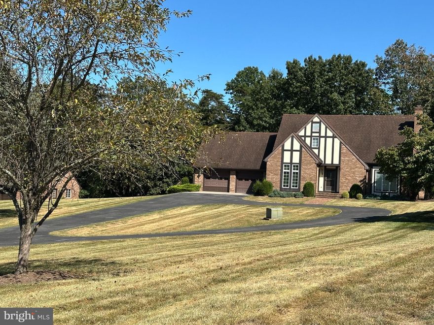 Lovely Tudor 3 bedroom, 2.5 bath home on 10 acres!! Located in a large lot subdivision between Shepherdstown and Martinsburg in a serene setting with mountain views. Features include a large screened
sunroom, living room with fireplace, primary suite with luxurious bath, main level office that could be used as a 4th bedroom, floored attic with staircase, attached 2 car and detached 2 car garages all situated on a partly wooded 10-acre lot. Horses are allowed!!