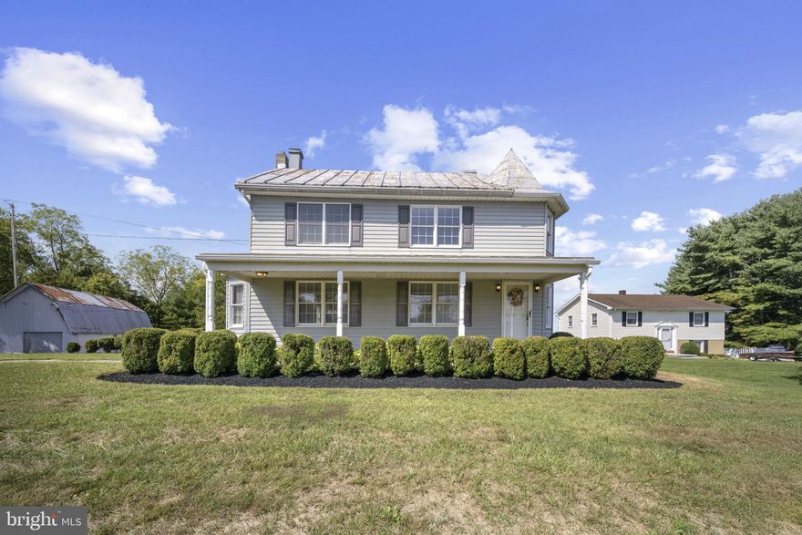 Don't be fooled by the year this house was built... it's been enlarged and improved upon! Upon arrival, you'll be impressed  by the serenity of the country location and the abundant,  level parking area.  The expansive front porch provides the perfect place to relax and enjoy the view, while the large, open back yard provides plenty of space for more outdoor enjoyment. The spacious country kitchen, added in 2004,  makes a great focal point for entertaining and gatherings. Need even more space? The  kitchen is constructed  to allow another addition to be added above.. The living room (with brand new carpet),  offers additional  space for gatherings, watching movies,  and peaceful nights soaking in the  cozy warmth from  the fireplace.  The stairs to the upper level, also newly carpeted,  lead to an open area that makes a nice office space or sitting room. Storage is not a problem in this home... from the walk up attic to the large basement, there are plenty of options. Speaking of storage, the large barn also provides space for a wide variety of uses! This charming home on a level acre has much to offer, come take a look!