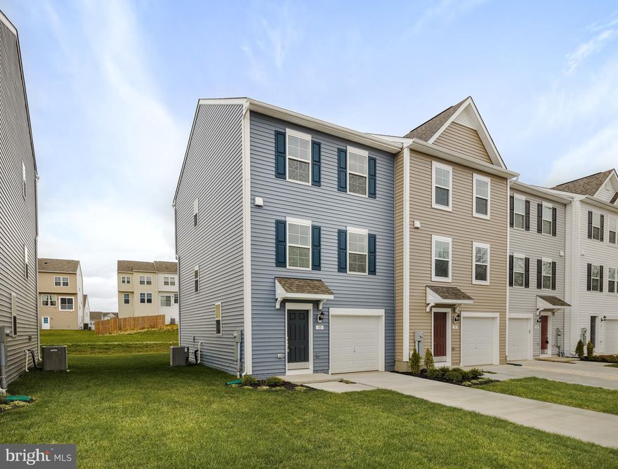 Brand new and ready for you to move right in!  This 3 BR, 2 Bath townhome is in a brand new neighborhood, with extra public parking for guests.  Be worry free and enjoy the sparkle of this beautiful end unit.  There's a single garage and plenty of storage on the 1st floor, kitchen and Family Room on the 2nd floor, with 3 bedrooms and 2 bathrooms upstairs.  Beautiful features include granite countertops and LVP flooring.   This home has never been rented or occupied.  Enjoy!