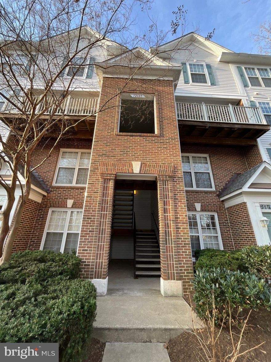 FULLY FURNISHED WITH BRAND NEW FURNITURE: This is the one you have been looking for. Centrally located near 286, Monument Dr, Fair Lakes Pkwy, 66, and 50. Penthouse - two level condo in Fair Lakes. Enjoy this light and bright corner unit with extra windows that flood this home with natural light and perfectly frame the wooded view that changes with the seasons. Why travel to enjoy the leaves transform in the Fall when you can relax in the comfort of your own home. Springtime is just as magnificent with a large Cherry Blossom. This floorplan is perfect for entertaining with an open concept design. Brand new modern flooring on the main level and brand new carpet upstairs. The kitchen was remodeled and features granite and a large peninsula for food prep, serving and eating. Brand new paint from top to bottom and brand new lighting fixtures. Relax in front of your gas fireplace for those cozy nights! Enjoy the serene view of birds while enjoying your favorite beverage from your private balcony. Upstairs features two Owner's Suites both with private bathrooms, walk-in closets and vaulted ceilings. One has a separate tub and shower. Convenient laundry room near both bedrooms. Prime location close to many shops and restaurants yet this property is located in a private and peaceful setting. Very short distance to BOEING, Fair Lakes Shopping Center and minutes to Fairfax Towne Center, Fair Oaks Mall, Fairfax Corner, Whole Foods, Wegmans, Target, Best Buy, BJ's, Olive Garden and so much more!