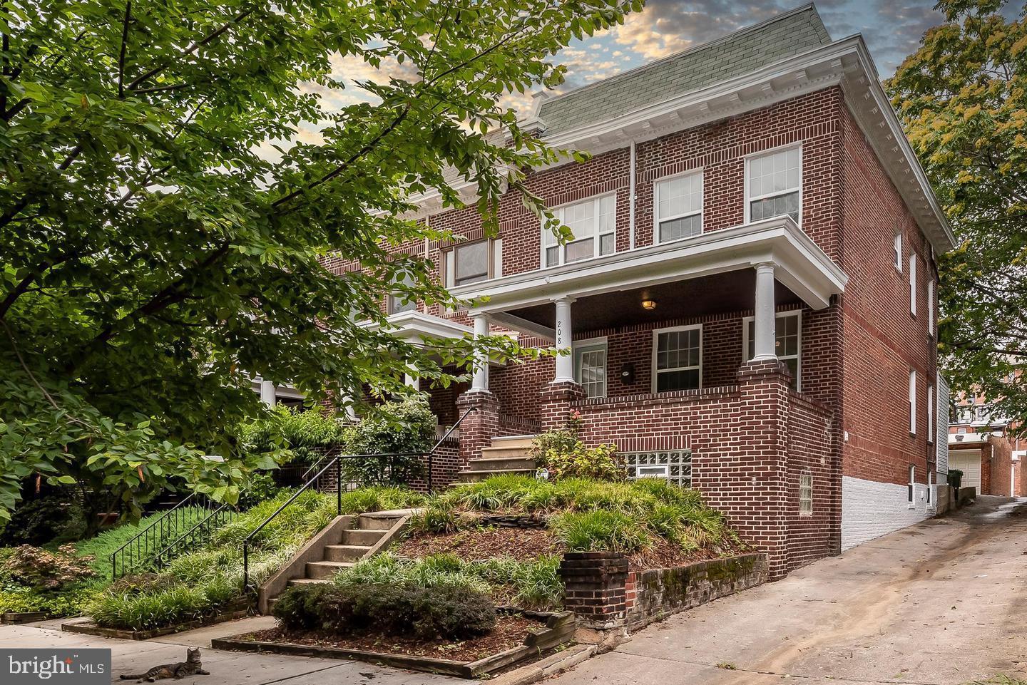 This classic Charles Village home blends historic character with modern updates in a prime location near Johns Hopkins University. A welcoming front porch leads to a spacious foyer and striking original staircase. The renovated kitchen opens to the formal dining room and features Calacatta Vicenza quartz countertops, stainless steel appliances, gas range with hood, built-in microwave cabinet, glass-front display cabinet, subway tile backsplash, and pantry area.
Refinished hardwood floors, upgraded lighting, and detailed moldings enhance the interior throughout. The upper level includes four generously sized bedrooms, one with a private screened-in porch. Full bathrooms are located on both the main and upper levels. The finished lower level adds a fifth bedroom, full bath, storage room, and utility space.
A rear paver parking pad accommodates two or more vehicles. Major updates include a roof replacement in 2020.
Centrally located, this home offers easy access to the Baltimore Museum of Art, Union Memorial Hospital, and cultural destinations in nearby Hampden, Remington, and Waverly. Penn Station is five minutes away, and the free Purple Line circulator provides convenient city access.
Enjoy the walkable lifestyle of Charles Village with dining, shopping, and transit options just moments away.