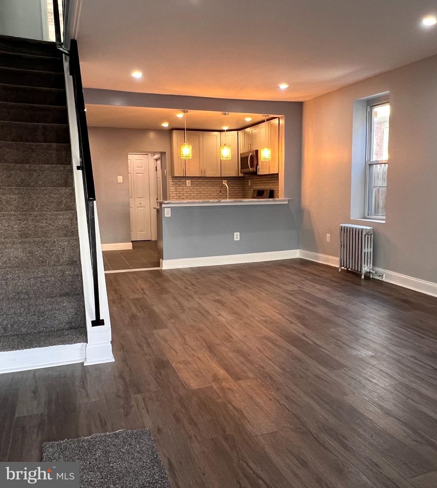3 bedroom 1.5 bathroom end of row, home. With the city grants, get into this lovely remodeled house with little down and pay less monthly than renting.