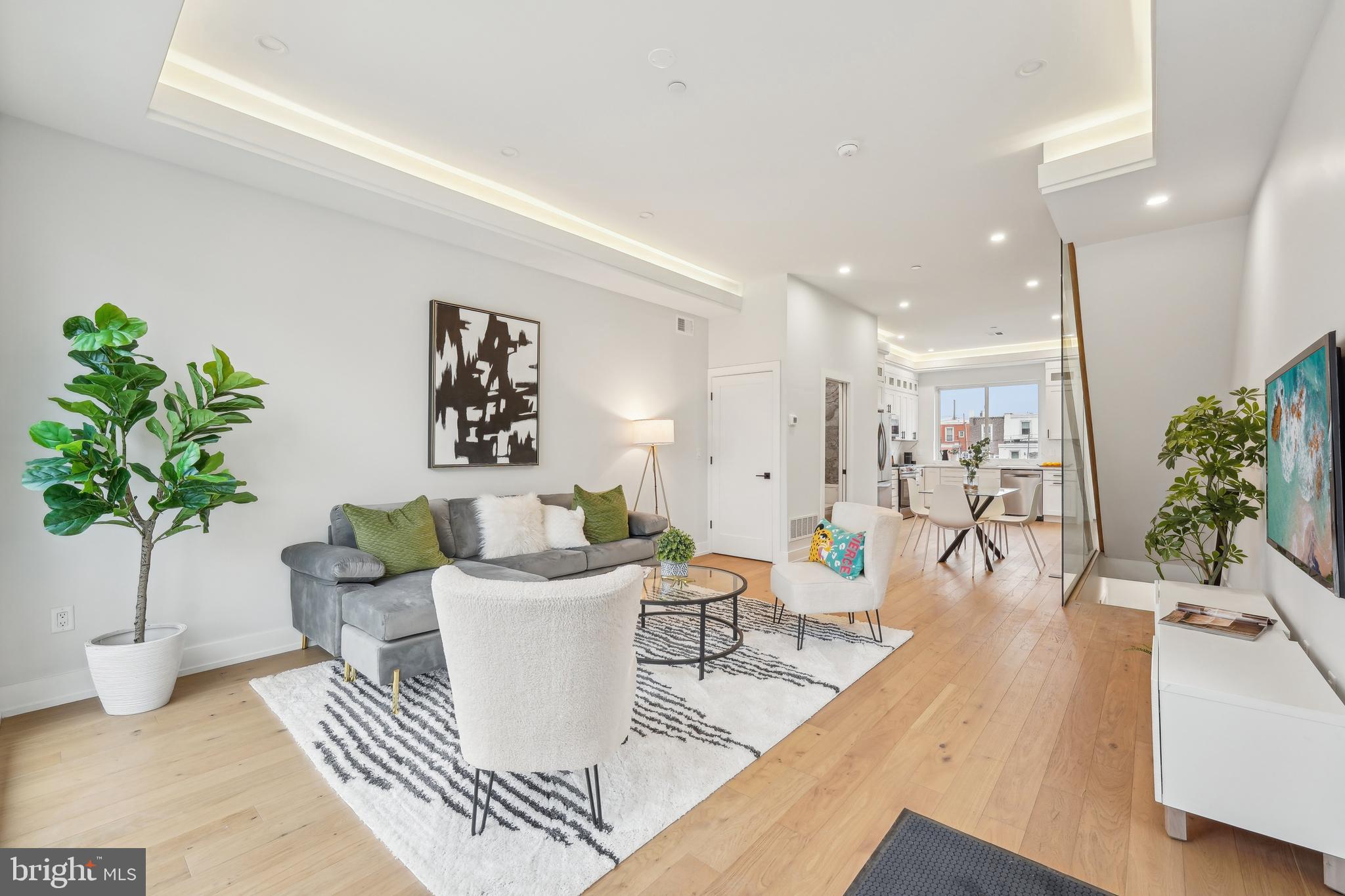 Discover Gaul Street Residences—a stunning new townhome community in the heart of Port Richmond (ZIP Code 19134). These contemporary townhomes, each offering approximately 1,800-2,000 square feet of living space across three levels, are designed for modern living with both style and comfort in mind.
Each home features spacious master bathrooms with elegant glass enclosures and heated floors for a true spa-like experience. The second-floor bathroom includes an extra-large tub—perfect for unwinding after a busy day. Expansive glass partitions in the living room flood the space with natural light, enhancing the home's open and welcoming design.
A standout feature is the large third-floor balcony—an ideal spot for outdoor relaxation or entertaining. Plus, the unfinished basement adds an additional 600 square feet of potential, ready to be transformed into a home gym, extra storage, or a personalized living space.
Ambient lighting hidden in the tray ceilings casts a soft, inviting glow throughout the living areas, adding a touch of sophistication and setting the perfect tone for everyday living and special gatherings.
All appliances stay with the buyer, adding extra value and convenience.
Families will appreciate the convenience of nearby amenities, including an elementary school and early learning center just minutes away. A beautifully renovated park, located just a block and a half from your door, offers plenty of space for outdoor fun and relaxation.
Starting prices for these pre-construction townhomes range from $499,900 to $620,000—an incredible value in one of Philadelphia's most vibrant and up-and-coming neighborhoods.
Gaul Street Residences is the perfect place to call home if you're seeking a blend of modern design, community amenities, and an energetic local vibe. Don’t miss out on this exciting opportunity!