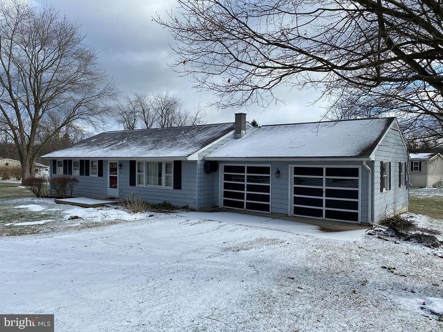 Larger Corner Lot Ranch home in the quaint town of Milheim, Centre County.  Conveniently located blocks from downtown amenities.  3BR, 1.5 BA, 1288 sq. ft. with screened sunroom at rear, handsome hardwood floors, family room in basement, spacious lower level ready for craft room, office or additional bedrooms,  laundry on main level or basement, eat-in kitchen with space for larger table and china cabinet.   Must see to appreciate this solid home in quiet neighborhood.