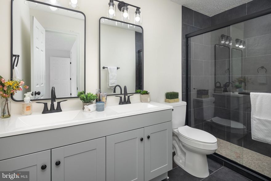 Welcome home to this beautifully renovated 2-bedroom, 2-bathroom condo in the sought-after Westmaren Condo Community of Ashburn Farm! Offering nearly 1,000 square feet of stylish one-level living, this light-filled home features soaring vaulted ceilings, separate living and dining areas, and a cozy wood-burning fireplace that creates the perfect blend of warmth and charm. Step outside to your private balcony, ideal for relaxing with morning coffee or unwinding at the end of the day.

The updated galley-style gourmet kitchen is designed to impress with quartz countertops, brand-new soft-close cabinetry, stainless steel appliances, a gas range, breakfast bar seating, and a brand-new stackable washer and dryer. Every detail has been thoughtfully upgraded, including fresh interior paint, all-new lighting, upgraded wall outlets and smart switches, ceiling fans, door hardware, new blinds, and plush new carpet in the bedrooms, making this home truly move-in ready.

The spacious primary suite offers a beautifully renovated spa-like bathroom featuring a walk-in shower and double vanity, while the secondary bathroom has been fully updated with a new shower/tub, flooring, and hardware. Additional recent improvements include living room flooring (2024), polybutylene pipe replacement (2024), HVAC furnace replaced in the last 5 years, dryer inspection, new garbage disposal, faucets throughout, and never-used 2026 appliances and fixtures.

Enjoy an unbeatable Ashburn Farm lifestyle with the community pool directly across the street and exceptional amenities just steps away, including a clubhouse, fitness center, tennis courts, ball fields, playgrounds, scenic ponds, picnic areas, walking trails, lakes, and bike paths. Greg Crittenden Memorial Park, Ashburn Farm Community Center, and Windmill Park are all just around the corner. Conveniently located within walking distance to shops and restaurants and only minutes from the Metro, airport, and major commuter routes, this turnkey home offers the perfect combination of comfort, convenience, and community living.