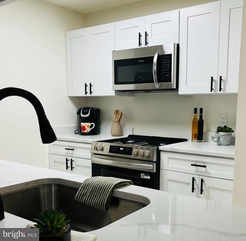 Photo of 21009 Timber Ridge Terrace #203, ASHBURN, VA 20147 (MLS # VALO2125412)