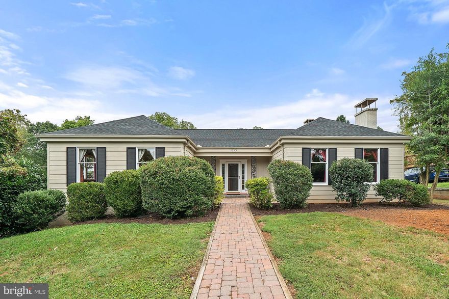 Here is your opportunity to own a beautiful custom built home in the well established neighborhood of Oaklawn. This home is loaded with unique features throughout. Main level offers Cherry hardwood flooring, extra large formal living room with fireplace, separate formal dining room and family room off the kitchen with a cozy fireplace. Corian countertop in the kitchen. Each bedroom is open to the lovely balcony that wraps all the way around to the peaceful screened porch with a hot tub! Don't forget to tour the huge walk up attic. The finished basement offers a wet bar, brick fireplace, another large bedroom and bath. Tons of room to entertain. So many details throughout. New roof in 2016