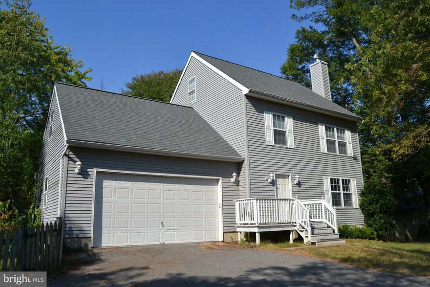 GREAT VALUE ALERT!! This Ellicott City Colonial is truly a diamond in the rough nestled among homes selling for three quarter of a million dollars or more (and with no HOA fees)!  Check out the mile long feature list including A BRAND NEW ROOF, 5 bedrooms, 3   baths, a large deck & 2 car garage just for starters.  Situated so close to sought after Mt. Hebron High School that you can watch the football team practicing!Would you like a tucked back 1/2 acre lot with a level fenced in yard, large deck & plenty of parking for friends and family?  Good   check that off your list too!  This property includes a 900 sq foot workshop for an ideal home business, studio, band practice space, home gym or office.  The sky and your imagination is the limit with what you can do with this space!The main level boasts a large kitchen with stainless appliances, gas cooking & tons of counter space.  You will love the large pantry and the views of the back yard while washing dishes.    A large open dining & living area makes entertaining a breeze or head out to BBQ on the 40 foot long deck.  With 4 good size bedrooms on the upper level and a 5th bedroom with bath on the top level, you have GREAT SPACE TO SPREAD OUT!  This house has so much to offer and your finishing touches will make it your forever HOME!  FEATURES AND UPDATES New Roof in 2016 80 gallon water heater 5 bedrooms with 3   bath 4 finished levels HUGE 2+ car Garage , Large kitchen with stainless appliances Spacious laundry and storage room Wood burning fireplace Huge deck and fenced in yard Separate workshop or studio on property