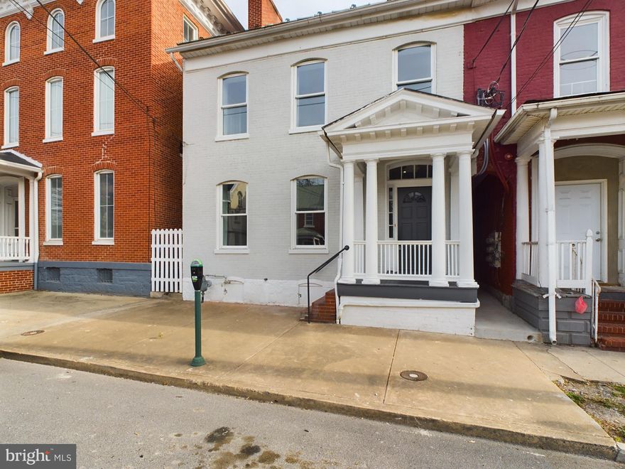 Welcome to this meticulously renovated quadruplex investment building, offering a harmonious blend of modern comfort and classic charm. Each unit has been thoughtfully designed to maximize space and functionality, providing an exceptional living experience for tenants and an excellent investment opportunity for savvy buyers.

Unit A:
This cozy 1 bedroom, 1 bathroom unit boasts a comfortable living space with ample natural light. The fully equipped kitchen is perfect for whipping up delicious meals, while the serene bedroom offers a peaceful retreat after a long day. This unit features new windows and LVP flooring throughout.

Unit B:
Step into this spacious 1 bedroom, 1 bathroom unit featuring an inviting ambiance and contemporary finishes throughout. The kitchen and living area provide the ideal setting for entertaining guests or relaxing with loved ones. This unit features new windows and LVP flooring throughout.

Unit C:
Enjoy the tranquil atmosphere of this charming 1 bedroom, 1 bathroom unit, complete with its own private porch. The kitchen is equipped with modern appliances, and the cozy bedroom offers a restful sanctuary. This unit features new windows and LVP flooring throughout.

Unit D:
Indulge in luxury living in this stylish 2 bedroom, 1 bathroom unit featuring a private balcony area, perfect for enjoying your morning coffee or soaking in the sunset within the city. The sleek kitchen and well-appointed living space create an inviting atmosphere for both residents and guests. This unit features new windows and LVP flooring throughout.

Additional Features:

Newly added parking lot at the rear provides convenience and ample parking space for tenants and visitors.
Each unit features its own kitchen, ensuring convenience and privacy for residents.
Thoughtful renovations throughout the building offer a seamless blend of modern amenities and classic charm.
Prime location with easy access to amenities, transportation, and entertainment options in Downtown Martinsburg.
A shared coin-operated laundry area finishes out the 3rd floor. 
Landlord is responsible for taxes, storm-water, trash and water with a set limit added to each Unit. 
Don't miss out on this rare opportunity to own a fully renovated quadruplex investment building in a sought-after location. Whether you're looking to expand your investment portfolio or seeking a comfortable living space with income potential, this property is sure to exceed your expectations. Schedule your viewing today and experience the epitome of urban living at its finest!

Current owner has already began filling each unit but will keep one unit open by request if a buyer is looking to live in one themselves. 

Private showings only with agents. Agent must accompany at all times.

Anticipated rent: $5,500/m