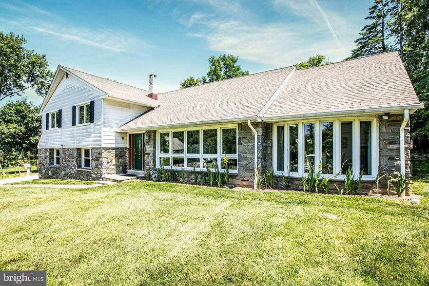 Nestled on a cul-de-sac on a private road in the heart of Merion Station, this dramatic and elegant  2,991 SQFT, fully renovated split-level home offers formal and casual areas for living and entertaining. With lots of natural light, this property is set on 0.40 Acres with a beautiful stone front for a maintenance-free exterior.
This home features 4 Bedrooms, 3 1/2 full baths, Indoor  Swimming Pool , Spa, finished basement, and minimal stairs to its upper and lower levels. A one car attached garage, with plenty of extra parking in the driveway. Brand new hardwood floors are found throughout most of the home (except for the kitchen) making for a nice flow from room to room. Custom french door welcomes you into a  Foyer with marble floors opening onto a large living room with a wall of windows and recessed lighting. Anderson windows are featured throughout the house which bring in the natural light. 
The living room flows into the spacious formal dining room built for entertainment, and is flooded with light from a curved wall of windows, ceramic floor,  complemented by recessed lights and surround sound ceiling speakers. Surround sound is also found in the kitchen, dining room, family room, office and backyard patio. 
State of the art kitchen with complete top of the line appliances, custom wood cabinets w/plenty of storage . Quartz  gourmet kitchen w/oversized center island with extra seating, double sinks, backsplash,  stainless steel appliances, Sub-Zero refrigerator, Wolf 6 burner stove top, double Wolf ovens, Viking warmer draw, 2 Fisher Paykel dishwashers draws , beverage fridge , recessed lights and ceramic floor.  
The lower level offers  a Great Room w/ gas fireplace, powder room, and a laundry room w/ newer washer and dryer. A wall of windows offers a great view of the indoor swimming pool area and jacuzzi / spa. 
The upstairs first level contains a Spacious Master Bedroom Suite with luxury full bath, two large walk-in closets with built-in shelves. The primary bathroom is equipped with a double sink vanity, walk-in shower, and gorgeous tile floors (Porcelanosa). Two additional large bedrooms on this floor as well as an additional full bath with soaking tub. 
On the Third floor there is an oversized additional suite with three walk-in closets and Full bath with walk-in tiled shower. All the tiles in the kitchen, Bathroom ,vanities, sinks,  shower sets are from Porcelanosa. Newer windows and sliding doors in the entire home, newer roof, two zone central A/C and Generator.
Don't miss the large room that is used as a home office with double glass, sliding doors leading onto the large  backyard patio featuring a built-in pergola and private backyard refuge, professionally landscaped and a perfect spot for entertaining guests. There is an assortment of fruit and nut trees on the property including, cherry, almond, plum, fig, blackberry and more.  
225 Melrose Circle  and its wonderful location offers access to all major routes, an easy walk to the train, is only minutes to Center City, and is situated within the award-winning Lower Merion School district. With its complete renovation, tasteful finishes and prime Main Line location, this gem is a dream come true. Owner holding NJ and PA Real Estate License.