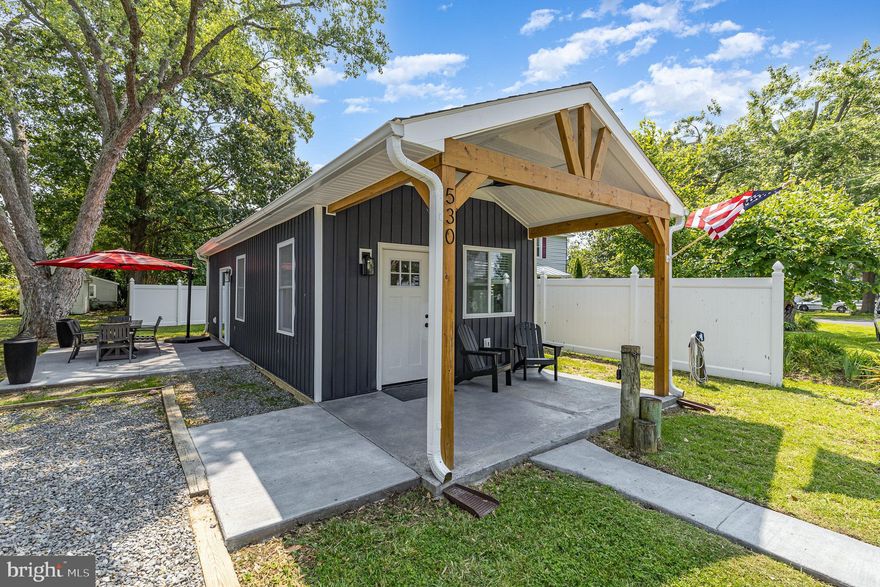 **Waterviews**Furnished**Classic 1940's Colonial Beach Bungalow has been Completely Renovated & Reimagined into Tiny House Living.   No Bedroom, Replaced with Queen Size Bunks.  Gorgeous Kitchen w/Quartz Counters, 42" Cabinetry, All New Stainless Steel Appliances & Mobile Island Table;  Full Bath w/Step In Shower, Tile Basin, Recessed Shelf & Frameless Glass Door; New Luxury Vinyl Plank Flooring Throughout; Washer & Dryer Included; Sliding Glass Door to Large Concrete Patio & Outdoor Living Space;  Relaxing Covered Front Porch w/Waterviews; Off Street Parking for 2/3 Vehicles;  Located in the Heart of "The Point" Just a Few Blocks to the Beaches, Restaurants, Marinas, Shopping and More!  Enjoy Everything Colonial Beach has to Offer!  Coming by Boat?  Monroe Bay Marina and the Boathouse Marina Offer Transient Slips and are Very Close By!  Bring your Golf Cart or Rent One While Here to Get the Full CB Experience!  Just 15 Miles to Dahlgren!